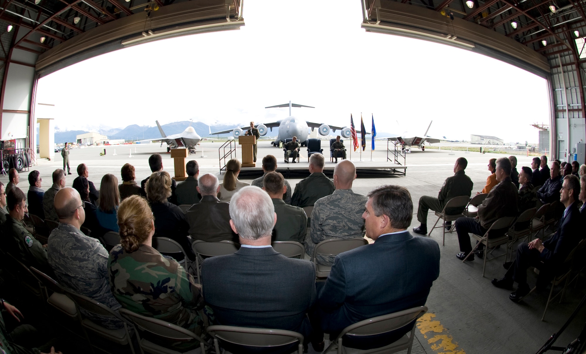 ELMENDORF AIR FORCE BASE, Alaska -- Col. Charles Foster, 176th Wing commander, speaks to the attendants of the Inital Operational Capabiltiy ceremony Sept. 5. The ceremony was held to celebrate the combat capability of the C-17 Globemaster III and the F-22A Raptor. (U.S. Air Force photo/Senior Airman Matthew Owens)