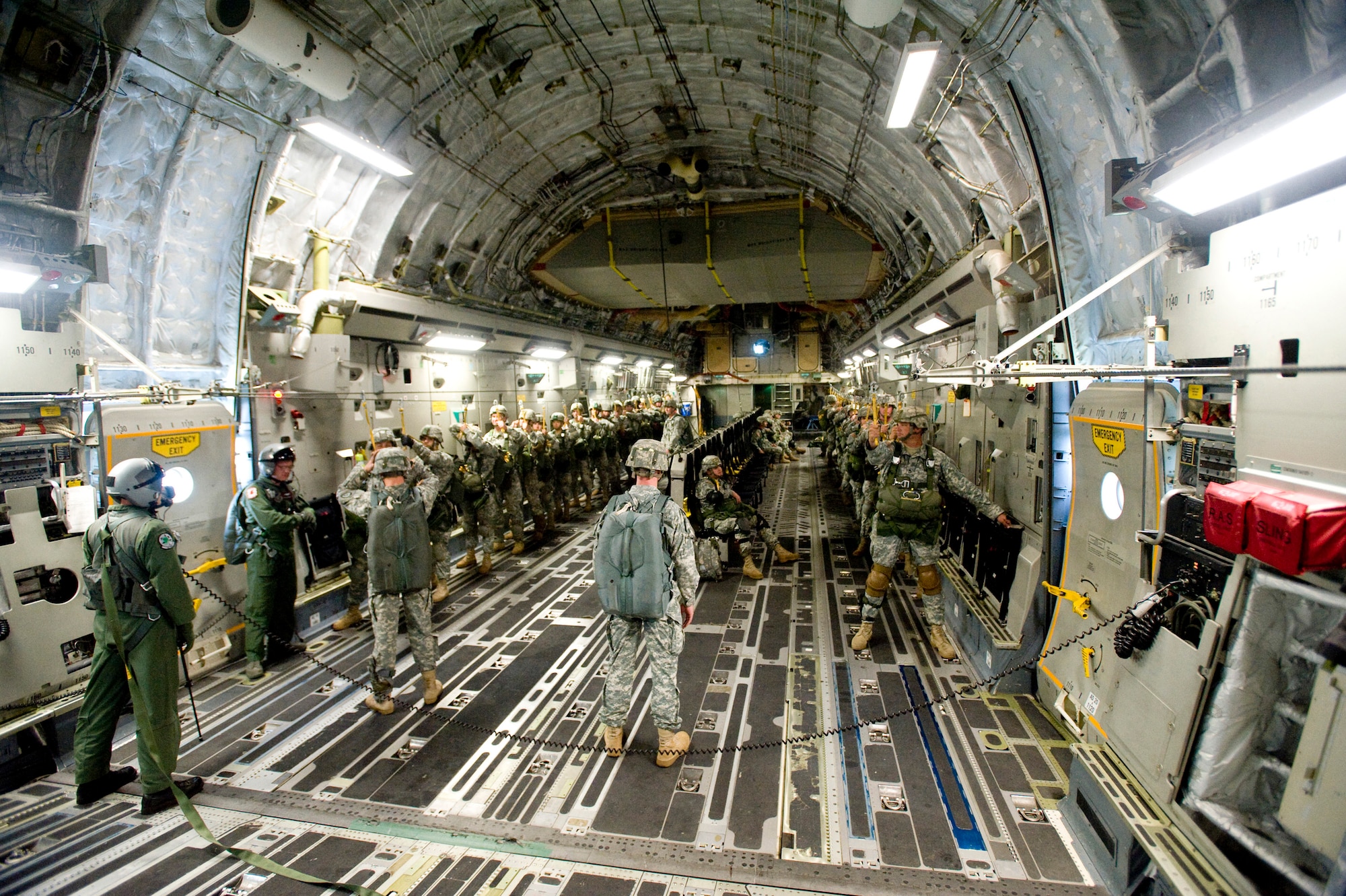 ELMENDORF AIR FORCE BASE, Alaska -- Soldiers from 1-40 Cavalry prepare for a jump from C-17 Globemaster III Sept. 5. The 1-40 Cavalry conducts independent reconnaissance and security missions in support of 4th Brigade Combat Team (Airborne), 25th Infantry Division operations at Fort Richardson. (U.S. Air Force photo/Senior Airman Jonathan Steffen)