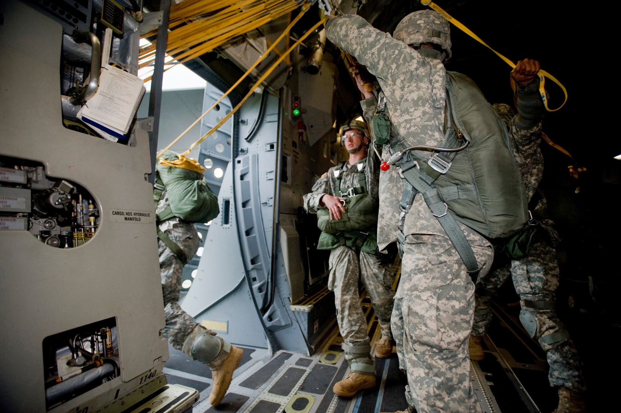 ELMENDORF AIR FORCE BASE, Alaska -- Soldiers from 1-40 Cavalry prepare for a jump from C-17 Globemaster III Sept. 5. The 1-40 Cavalry conducts independent reconnaissance and security missions in support of 4th Brigade Combat Team (Airborne), 25th Infantry Division operations at Fort Richardson. (U.S. Air Force photo/Senior Airman Jonathan Steffen)