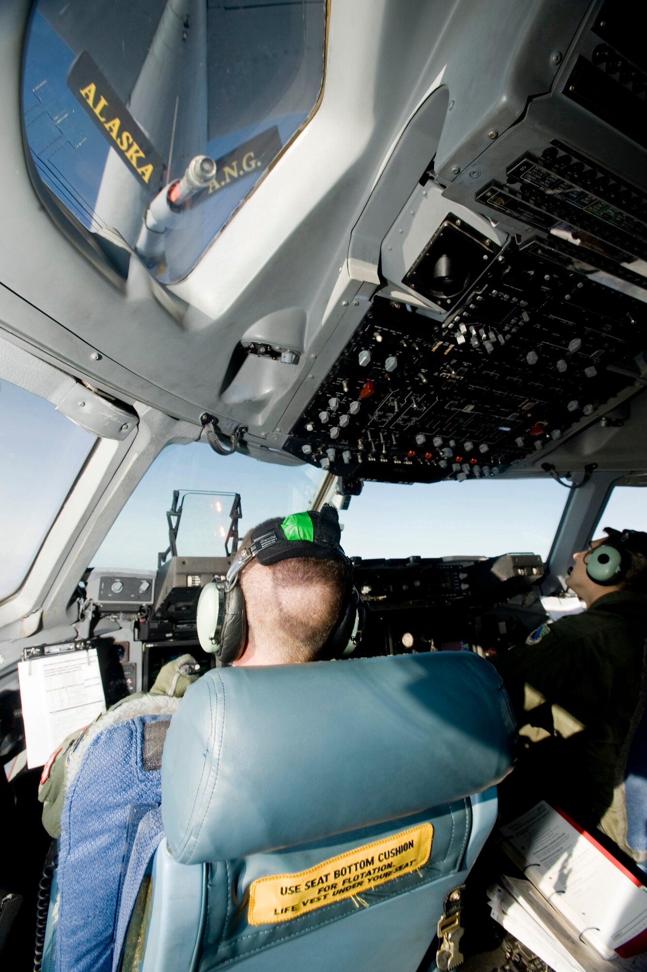 ELMENDORF AIR FORCE BASE, Alaska -- Lt. Col. Andy Hird and 1st Lt. Christopher Prentiss, 517th Airlift Squadron, maneuvers a C-17 Globemaster III into position for air refueling Sept. 5. The 517th AS can perform multiple tasks in a single flight including cargo air drop, troop delivery and air refueling to fulfill the world-wide air mobility requirements. (U.S. Air Force photo/Senior Airman Jonathan Steffen)