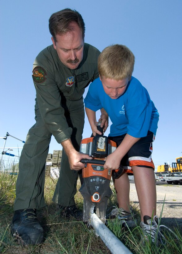 Francis S. Gabreski Airport, Westhampton Beach, N.Y. - 

On day four of Galaxy Camp, August 21, 2008, children learned about many different aspects of a Pararescue Jumpers job. The children learned about Self Aid and Buddy Care, became familiar with the parachute, learned how to tie different types of knots, used night vision goggles, was able to operate a Jaws of Life, and got the chance to repel.

(Official USAF photo by Staff Sgt. David J. Murphy)