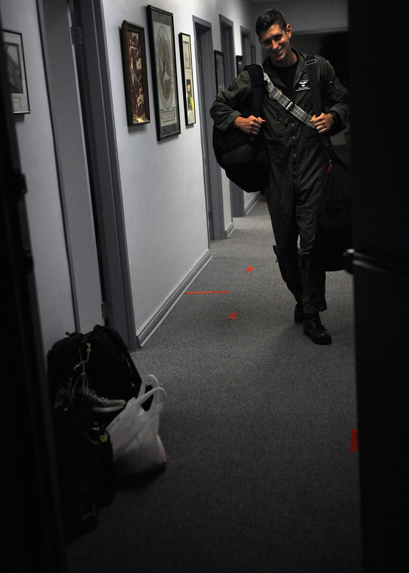 080908-F-9562B-066
MOODY AIR FORCE BASE, Ga. -- An A-10C Thunderbolt II pilot with the 75th Fighter Squadron, carries his bags here Sept. 8. The 75th Fighter Squadron deployed to Afghanistan in support of Operation Enduring Freedom. (U.S. Air Force photo by Senior Airman Brittany Barker)

