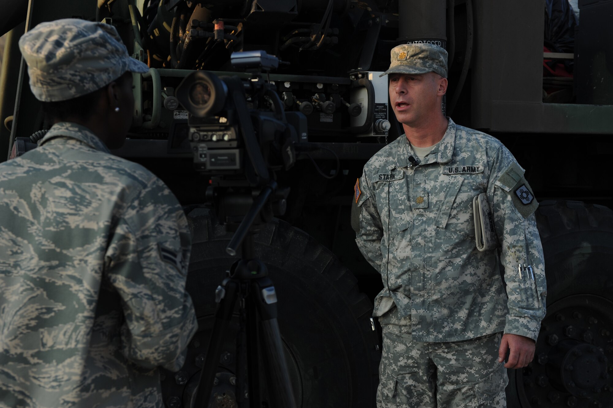 DYESS AIR FORCE BASE, Texas - Airman First Class Tarelle Walker, 7th Bomb Wing Public Affairs, interviews Major Daniel Stark, Executive Officer of the 1200th Infantry Battalion, New Mexico Army National Guard, about his current mission to assist in the Hurricane Gustav evacuation in Louisiana, here, Sept. 2. The New Mexico Army National Guard were one of the first to respond to Hurricane Katrina providing medical support, food, shelter and any other request.  Dyess Airmen are ready and willing to assist and support sister service members whether active duty, guard or reserve. (U.S. Air Force photo/ Senior Airman Courtney Richardson)
