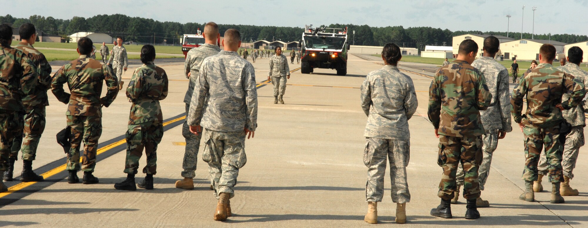 The 4th Fighter Wing conducts a foreign object & debris (FOD) check on the flightline after tropical storm Hannah hit Seymour Johnson Air Force Base, September 7, 2008, North Carolina. Seymour Johnson recieved minimal damage from topical storm Hannah. (U.S. Air Force photo by Airman 1st Class Gino Reyes) 