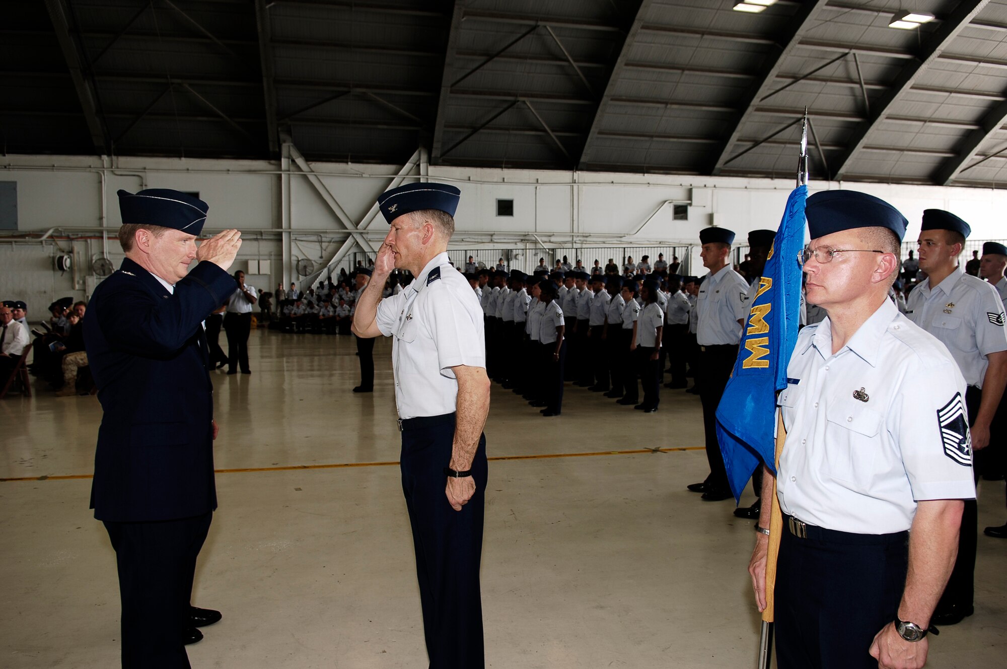 Col. Robert Thomas inspects members of the 6th Air Mobility Wing during a change of command ceremony Monday. He relinquished command of the wing to Col. Lawrence Martin.  (U.S. Air Force photo by Tech. Sgt. Sean White)