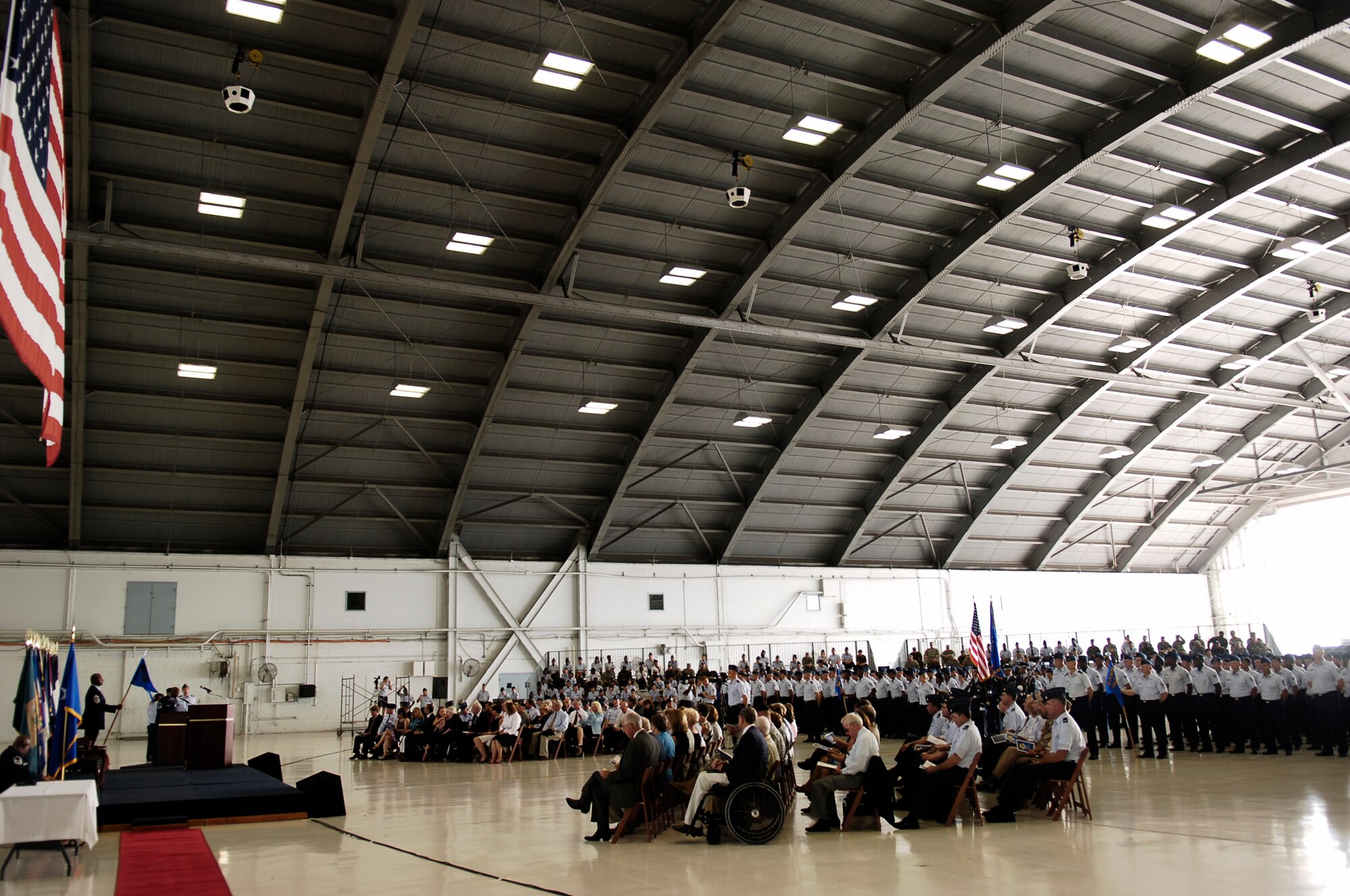 Team MacDill members and citizens of the Tampa Bay community attend the 6th Air Mobility Wing change of command ceremony Monday. Col. Robert Thomas relinquished command of the wing to Col. Lawrence Martin.  Col. Thomas heads to Fairchild Air Force Base to take command of the 92nd Air Refueling Wing. (U.S. Air Force photo by Tech. Sgt. Sean White)