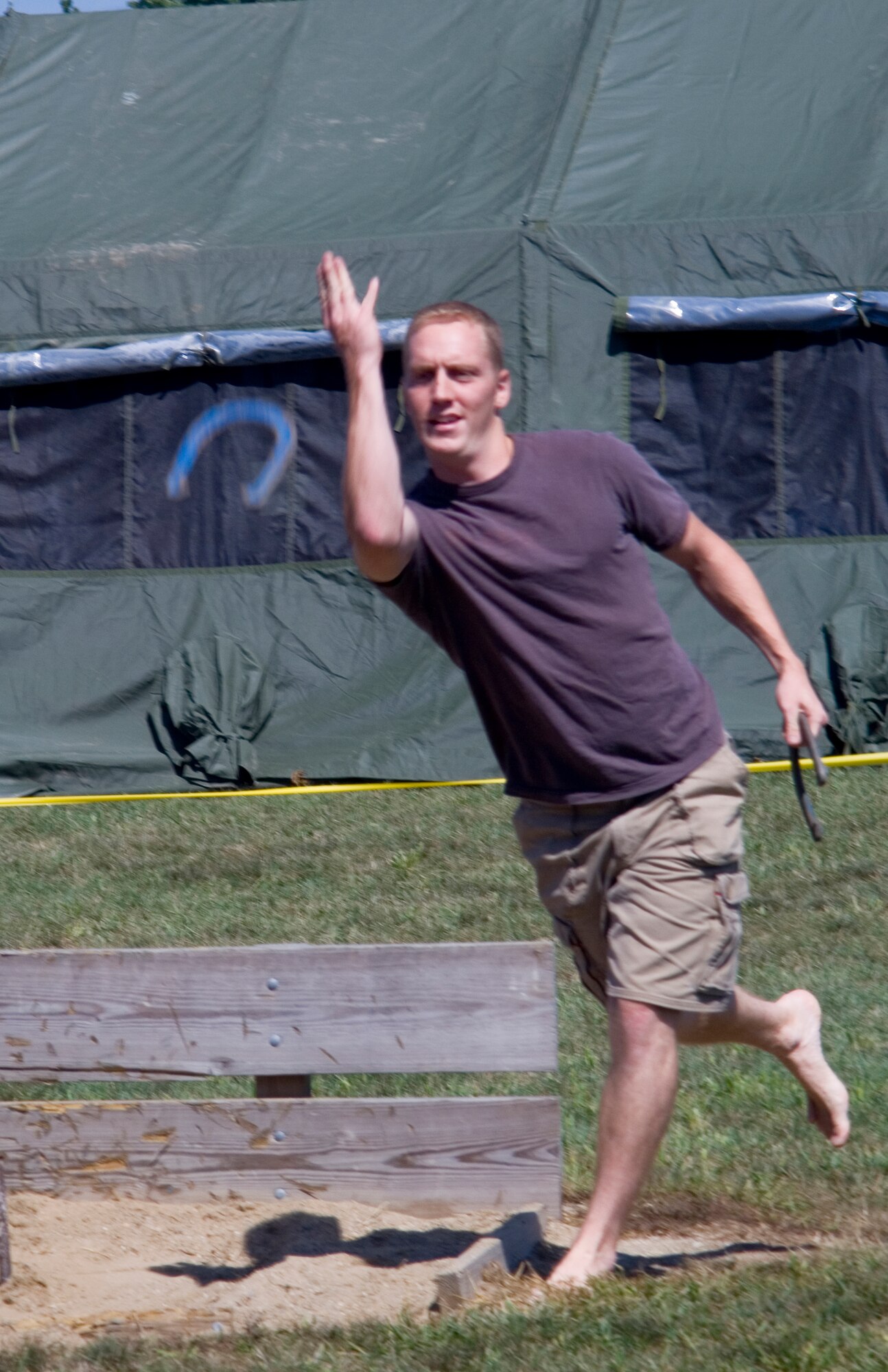 GRISSOM AIR RESERVE BASE, Ind., -- Tech Sgt. Steve Heidrich, an instrument technician with the 434th Aircraft Maintenance Squadron, competes in a game of horseshoes at the annual family day picnic. (U.S. Air Force photo/Senior Airman Ben Mota)