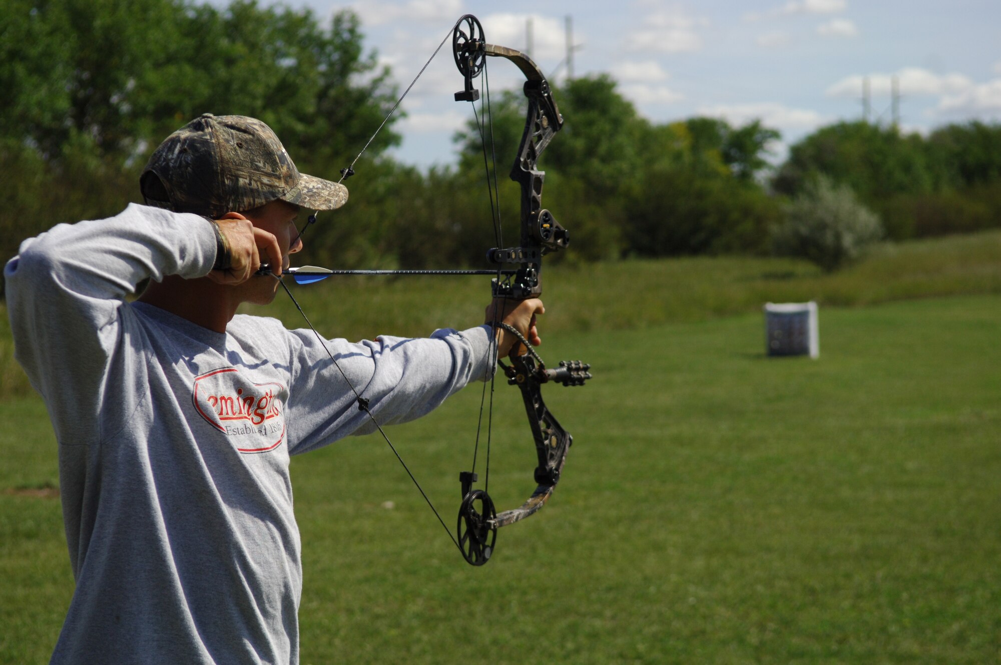 MINOT AIR FORCE BASE, N.D.—Mr. J-Anthony Crossett, 5th Civil Engineer Squadron surveyor, and Staff Sgt. Joe Austin and Senior Airman Robert Owens, both 5th Civil Engineer Squadron heavy equipment operators, prepare to fire at their practice targets before the archery tournament held Sept. 3 and Sept. 5 at the Minot AFB outdoor archery range. The two-day archery tournament is one of many outdoor events put on by base Outdoor Recreation. For more information on Outdoor Recs outdoor activities, log on to http://www.5thforcesupport.com/activities/outdoor/index.htm. (U.S. Air Force photo by Senior Airman Cassandra Jones)