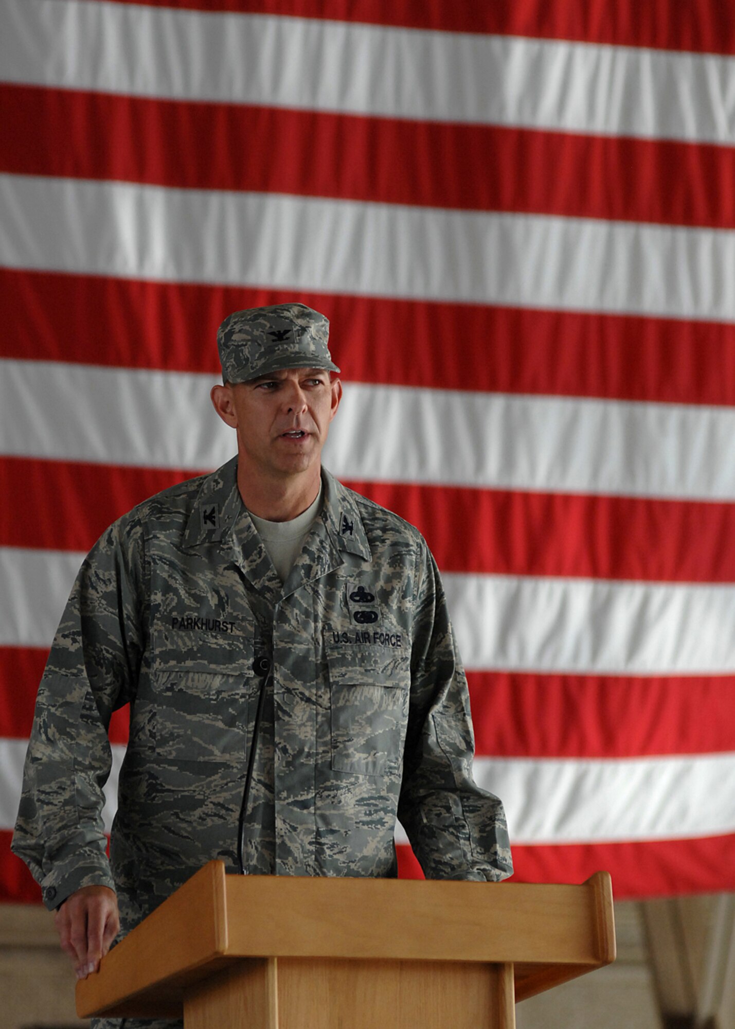 Col. Geoffrey Parkhurst, the new 56th Maintenance Group commander, delivers remarks to members of the audience at the 56th MXG change of command ceremony Aug. 29.