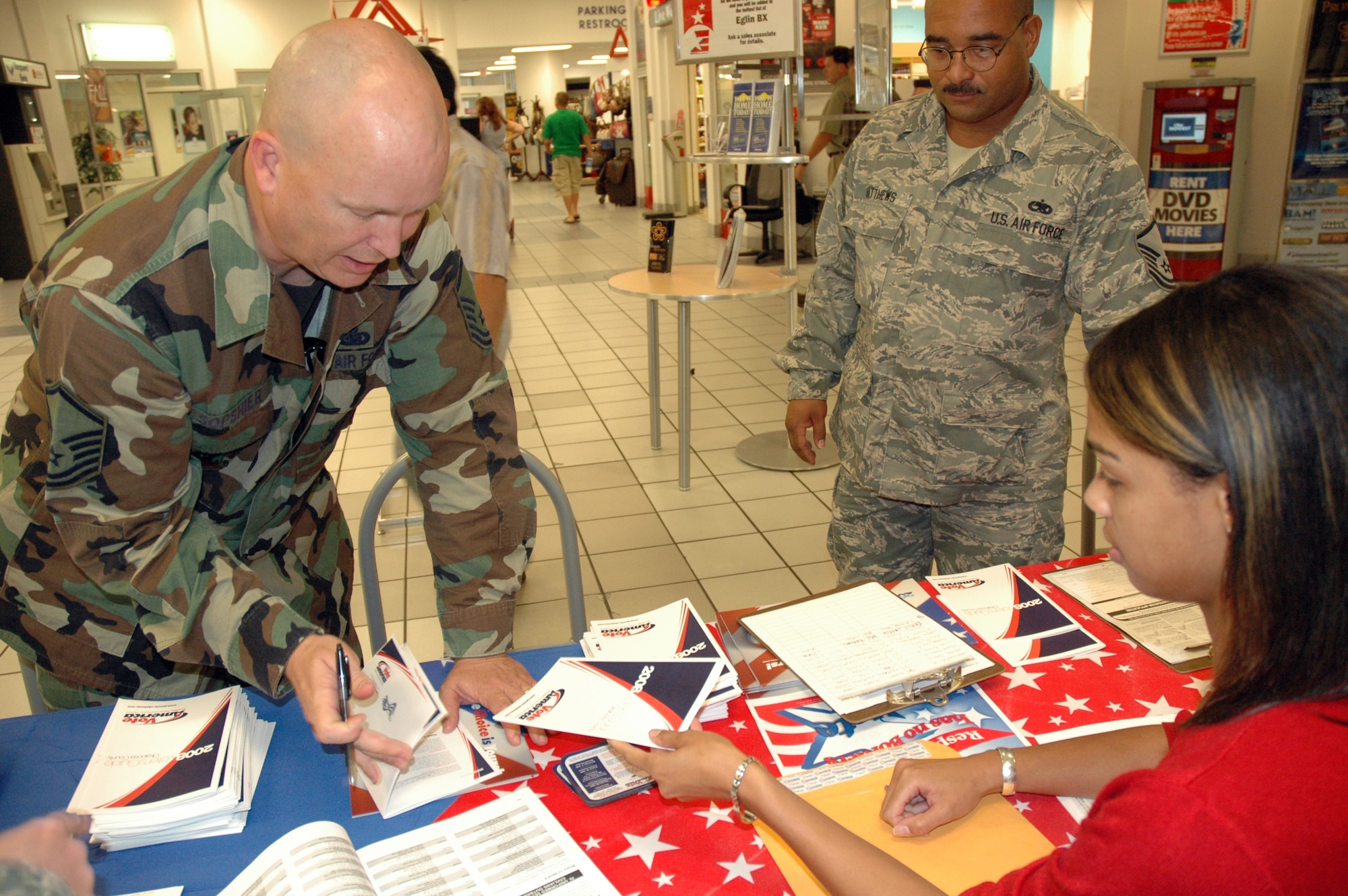 EGLIN AIR FORCE BASE, Fla. -- Master Sgt. David Sopshier, 33rd Maintenance Operations Squadron, fills out the necessary paperwork to allow him to cast his vote in the 2008 presidential election. August 31 through Sept. 7 is designated as Armed Forces Voters Week and this campaign held at the Eglin Base Exchange was geared at bringing voting awareness to servicemembers who have never cast a vote before or who will need to vote via absentee ballots. (U.S. Air Force photo/Airman 1st Class Anthony Jennings)