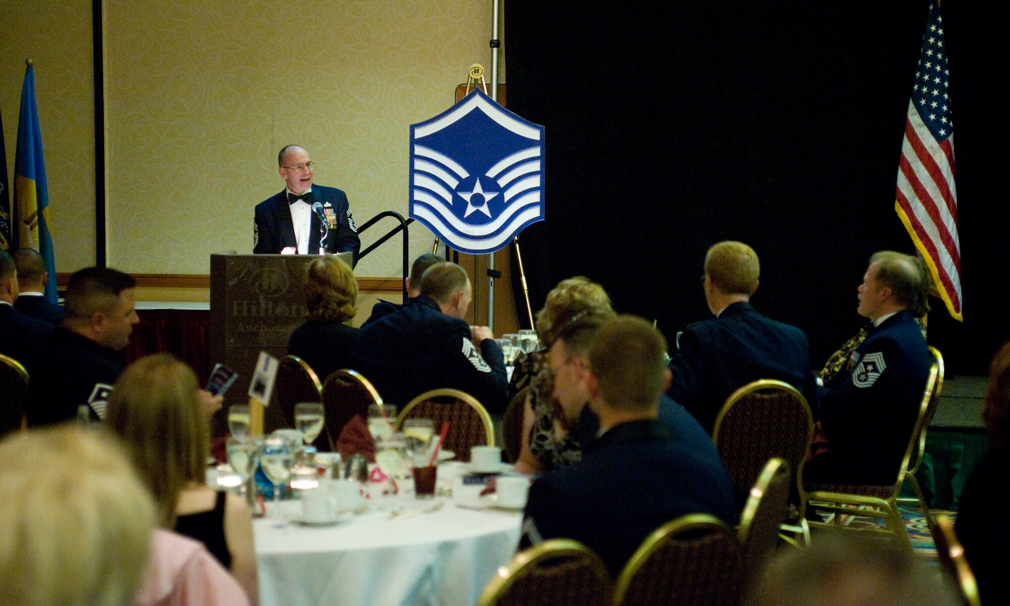 ELMENDORF AIR FORCE BASE, Alaska -- Command Chief Master Sergeant Robert Moore, 11th Air Force, speaks to the attendants of the Senior NCO Induction ceremony Sept. 9. More than 80 Senior NCOs were inducted during the ceremony. (U.S. Air Force photo/Senior Airman Jonathan Steffen)