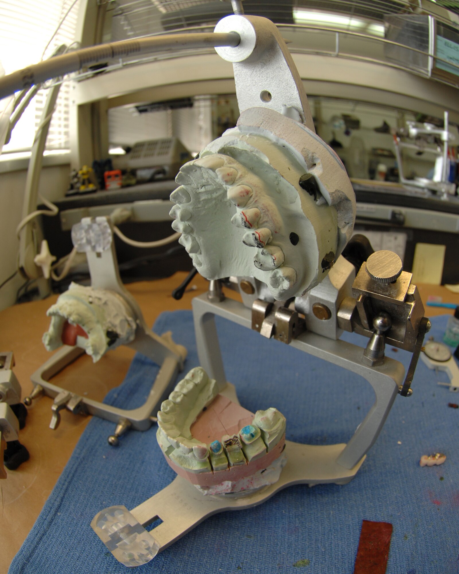 YOKOTA AIR BASE, Japan - The 374th Dental Squadron laboratory personnel make and design dentures, crowns, veneers, mouthguards, bridges and more. (U.S. Air Force photo by Airman 1st Class Jonathan Fowler)