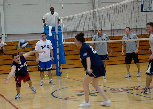 Christopher Batey attempts to save the ball for the LRS 1 team during an intramural volleyball match on base Sept. 9. The Flyers/OSS team defeated the LRS 1 team 25-16, 25-21. Batey is from the 437th Logistics Readiness Squadron. (U.S. Air Force photo/Airman 1st Class Katie Gieratz)