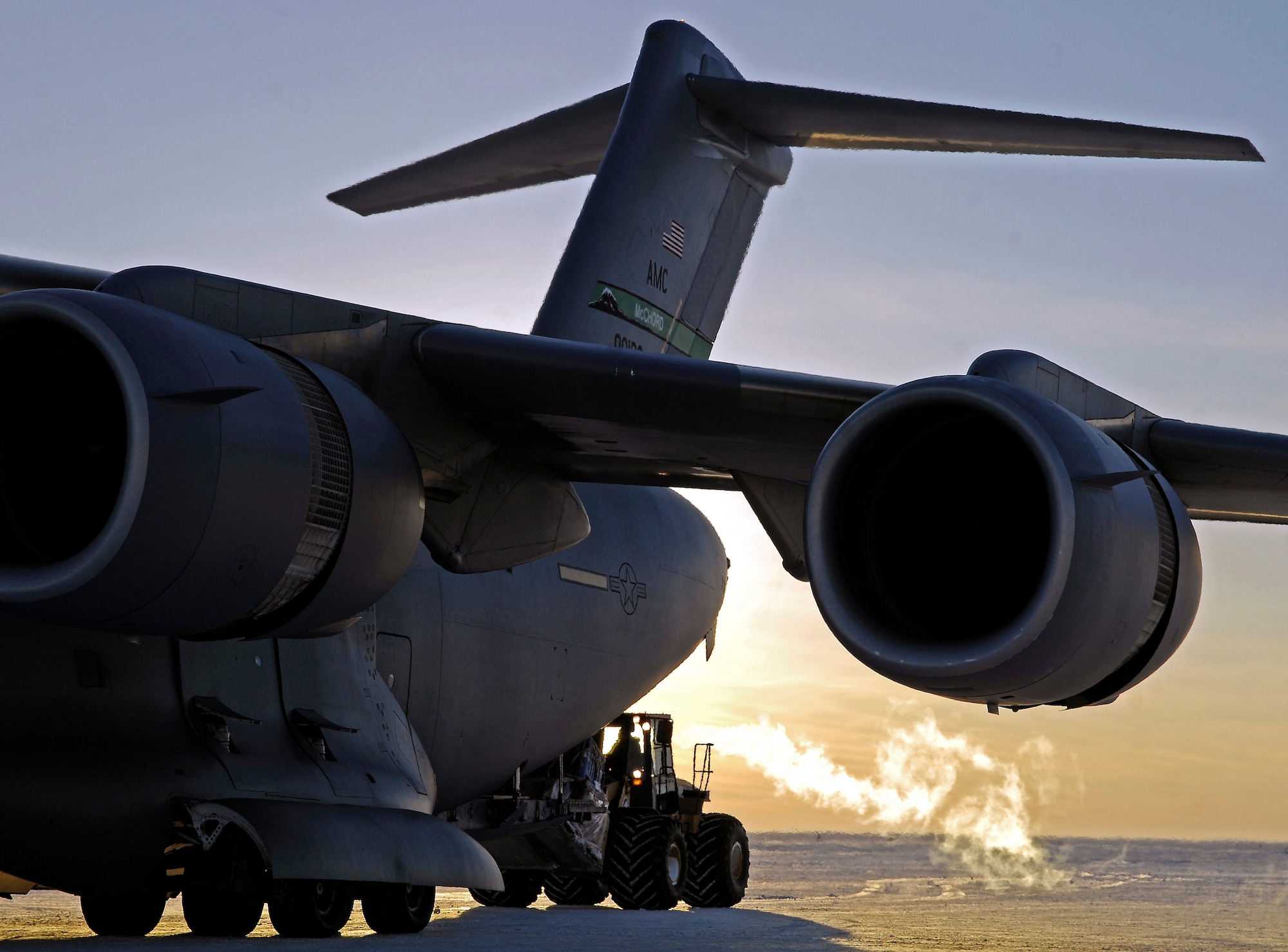 A C-17 Globemaster III from McChord Air Force Base, Wash., offloads cargo on the Pegasus Ice Runway near McMurdo Station, Antarctica, on Sept. 10. A McChord aircrew delivered hundreds of thousands of pounds of supplies and equipment to Antarctica over the past ten days as part of Joint Task Force Support Forces Antarctica, headquartered at Hickam AFB, Hawaii, and led by 13th Air Force.  The joint task force is currently conducting Operation Deep Freeze in support of the National Science Foundation and U.S. Antarctic Program.   (US Air Force photo / Master Sgt. Chris Vadnais)