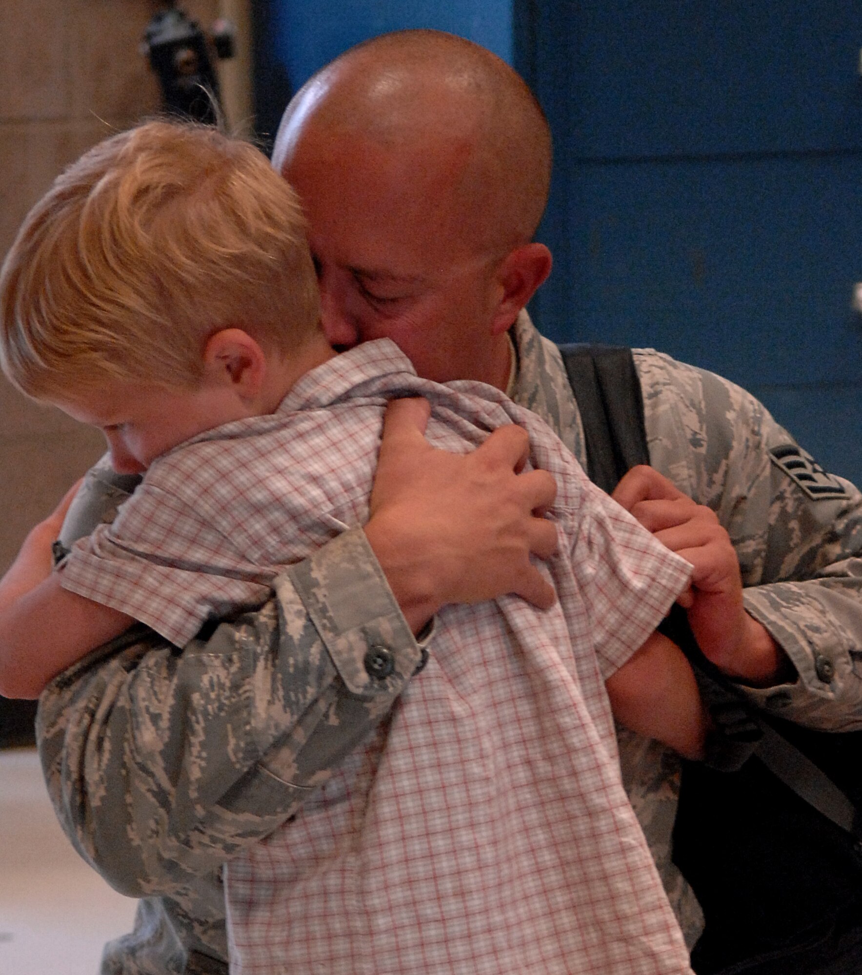 MOUNTAIN HOME AIR FORCE BASE, Idaho - Members of the 726th Air Control Squadron bid farewell to their families before departing. Approximately 140 Airmen from the 726th Air Control Squadron and over 40 members of the Puerto Rico and Oregon Air National Guards deployed to Southwest Asia Sept. 9 in support of Operation Iraqi Freedom. (U.S. Air Force photo/Airman 1st Class Renishia Richardson)