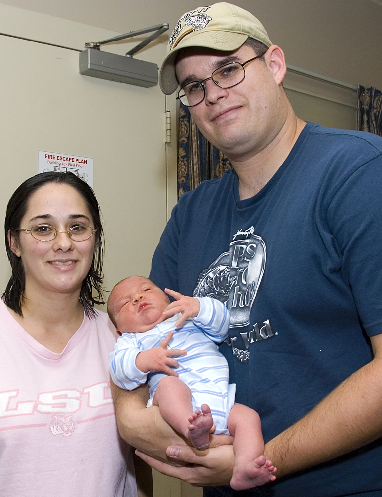 Hurricane Gustav evacuees Staff Sgt. Mike Shoulders and his wife, Melody, show off the newest addition to their family, Joseph Michael Shoulders, who was born Aug. 31 at Jackson Hospital in Montgomery, Ala. Sergeant Shoulders is a 331st Recruiting Squadron recruiter who lives in Covington, La. (U.S. Air Force photo/Jamie Pitcher)