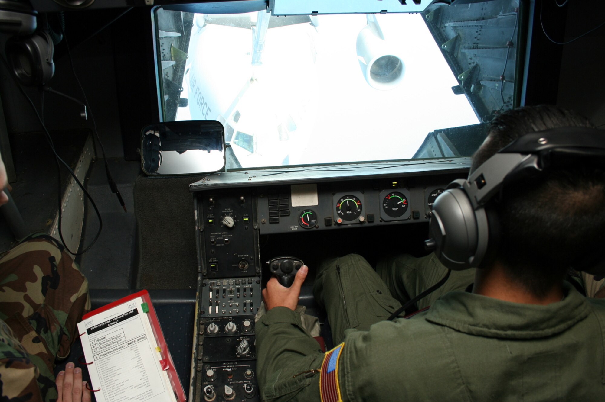 Senior Airman Jonathan Wong, 76th Air Refueling Squadron KC-10 boom operator, refuels a C-17 during the mobility exercise here Sept. 8. The exercise is helping Team McGuire members prepare for next year’s Operational Readiness Inspection. (U.S. Air Force photo/Capt. Darrick Lee)