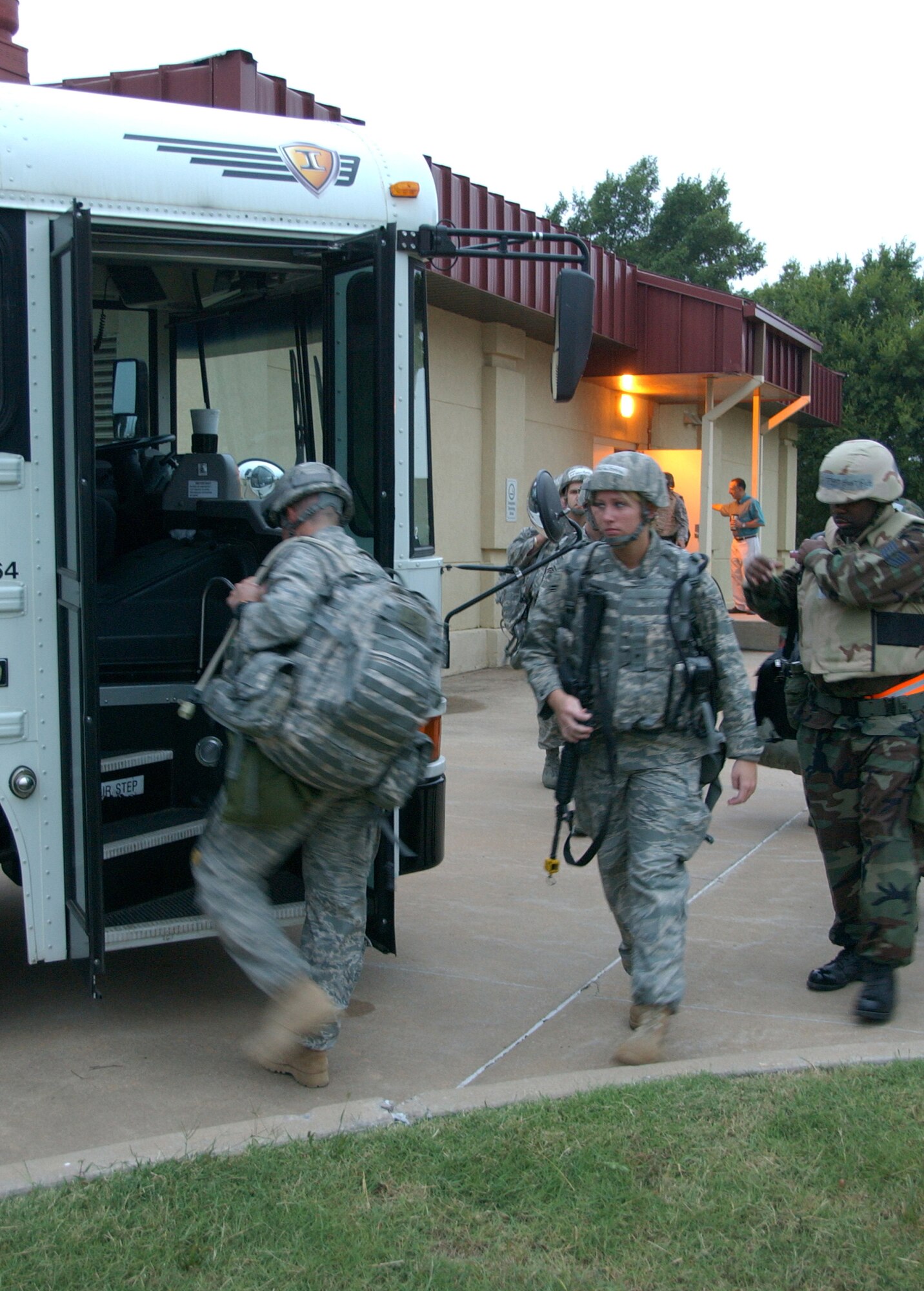 Vance Airmen board a 7 a.m. bus to participate in a field training exercise here Sept. 10 and 11. (U.S. Air Force photo by Staff Sgt. Brian Hill)                                                                  