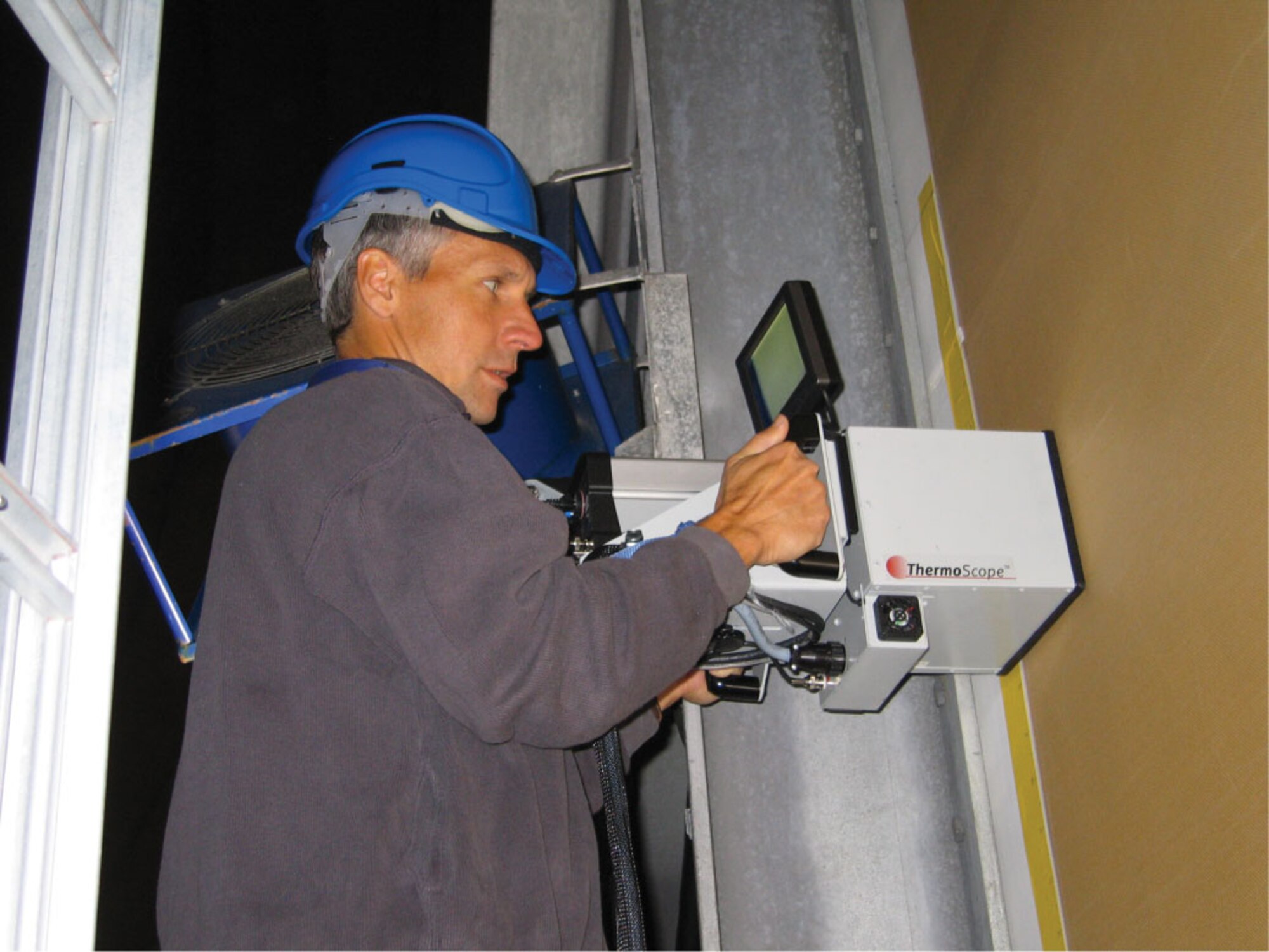 AFRL structural materials evaluation engineer Mr. Kenneth LaCivita performs a pulsed-thermography inspection in Vardo, Norway.  (U.S. Air Force photo)