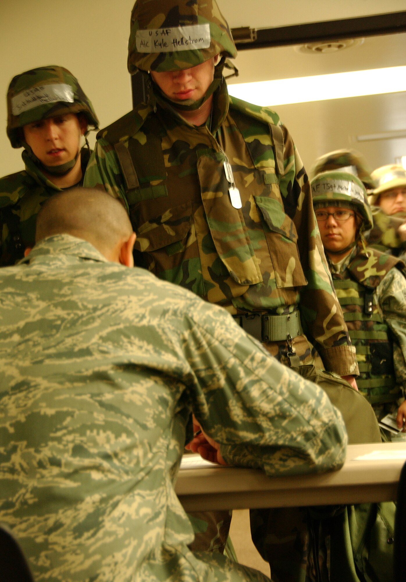 Airman 1st Class Kyle Hellstrom, 71st Communications Squadron, is processed through the deployment line Sept. 10 prior to departing for an exercise location on base. Vance Airmen are participating in this field training exercise Sept. 10 and 11. (U.S. Air Force photo by Staff Sgt. Brian Hill)                              