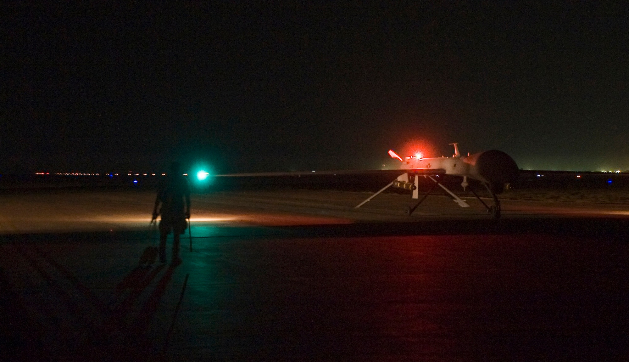 An MQ-1 Predator taxies on the flightline after a mission Sept. 3 at Ali Base, Iraq. The unmanned aircraft system is assigned to the 46th Expeditionary Reconnaissance Attack Squadron Det. 1. Through the use of advanced capabilities, focused doctrine and detailed training, the Predator provides integrated and synchronized close air combat operations, to include intelligence, surveillance and reconnaissance. (U.S. Air Force photo/Airman 1st Class Christopher Griffin) 
