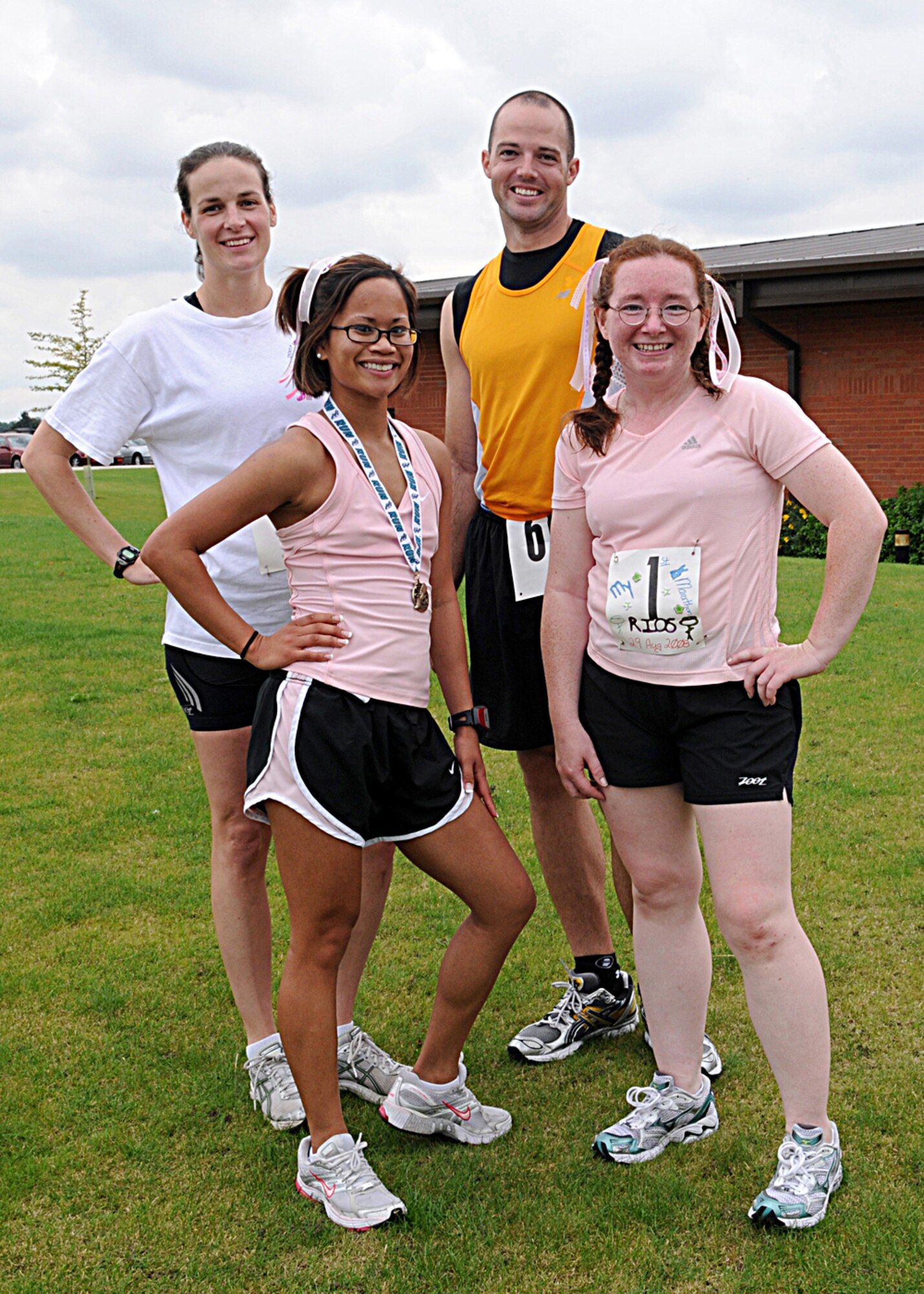 From left, Maj. Deborah Newman, Senior Airman Trasy Rincan, Staff Sgt. Brian Morris and Tech. Sgt. Angel Rios were among the runners who participated in Team Mildenhall's half marathon, A Race to Remember, Aug. 29. (U.S. Air Force photo by Staff Sgt. Jerry Fleshman)  