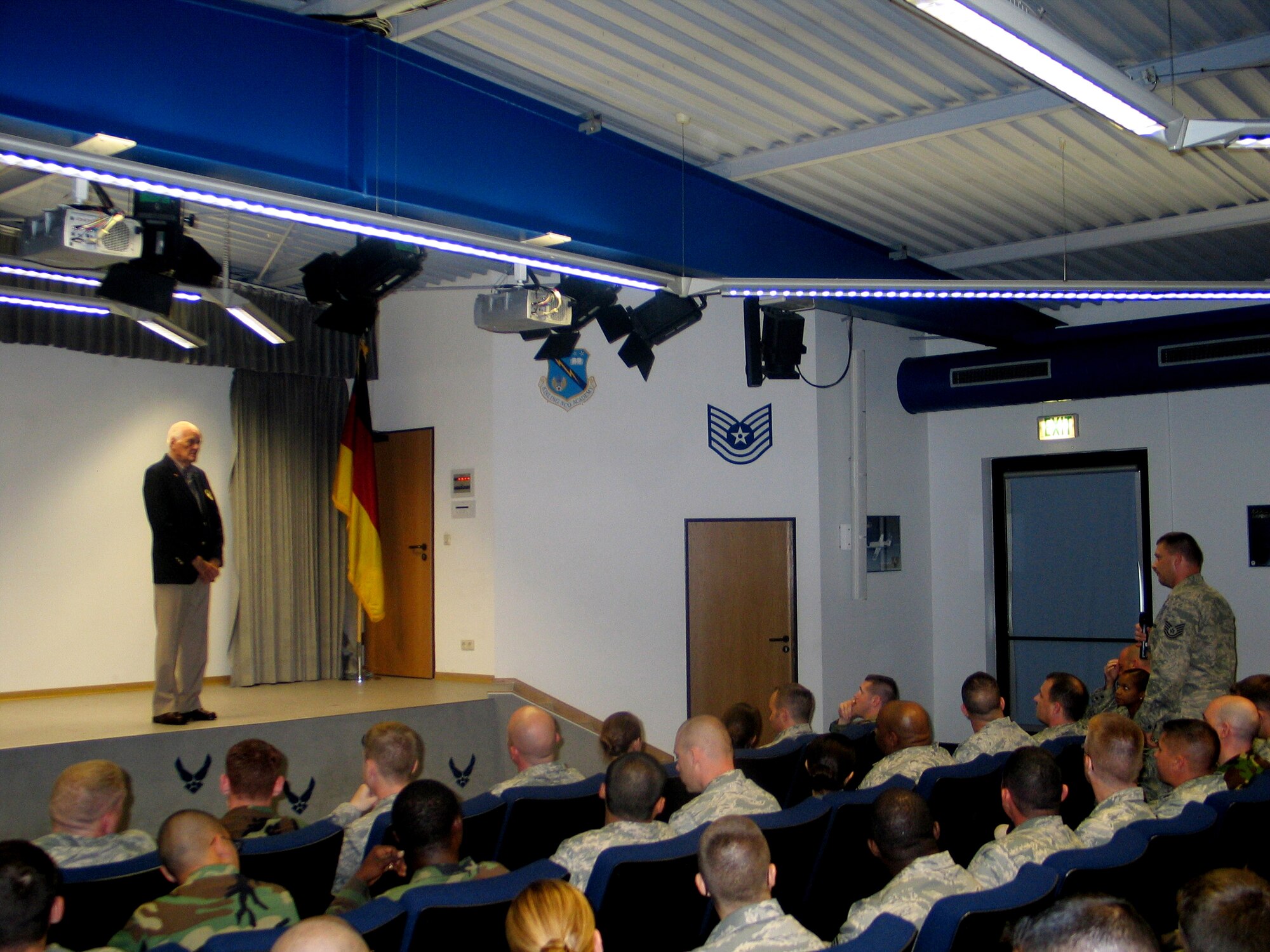 Former Air Force pilot Mr. Edwin Gere speaks Kisling NCO Academy and Airman Leadership School students Sept. 4, 2008, Kapaun Air Station. Sixty years ago, Major Gere, flew much needed supplies to more than 2 million Germans living in West Berlin during the Berlin Airlift from 1948-1949. (U.S. Air Force photo by Tech. Sgt. Rodney Deese II)(Released)