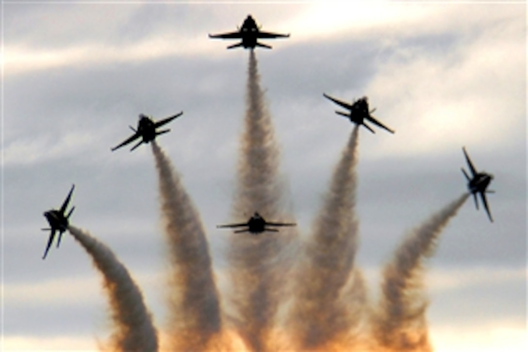 The U.S. Navy flight demonstration team The Blue Angels perform for more than 100,000 guests during the Great State of Maine Air Show, Brunswick, Maine, Sept. 7, 2008. The air show brought performances by the Blue Angels, The U.S. Army Golden Knights parachute team, and a wide variety of static displays and interactive exhibits. The show drew more than 150,000 people over three days. This will be the final Navy-sponsored air show at this location before NAS Brunswick closes in 2011.