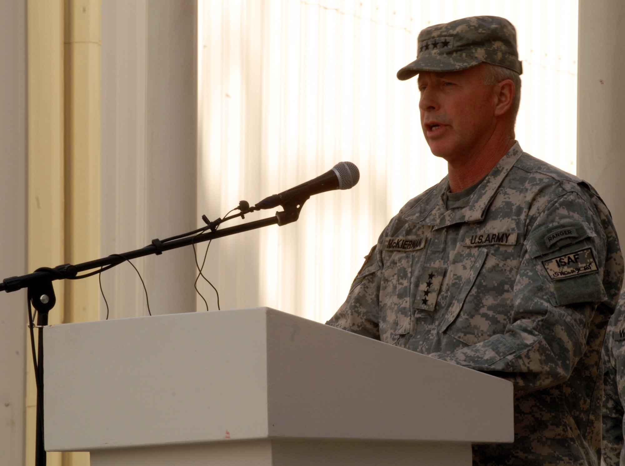 BAGRAM AIR FIELD, Afghanistan (Sept. 11, 2008) -- Gen. David D. McKiernan, commanding General for International Security Assistance Forces in Afghanistan, speaks during the 9/11 ceremony that was held on Bagram.  Troops from Coalition and ISAF, along with contractors and employees on base, gathered for the ceremony Thursday.  (U.S. Army photo by Spc. Scott Davis)
