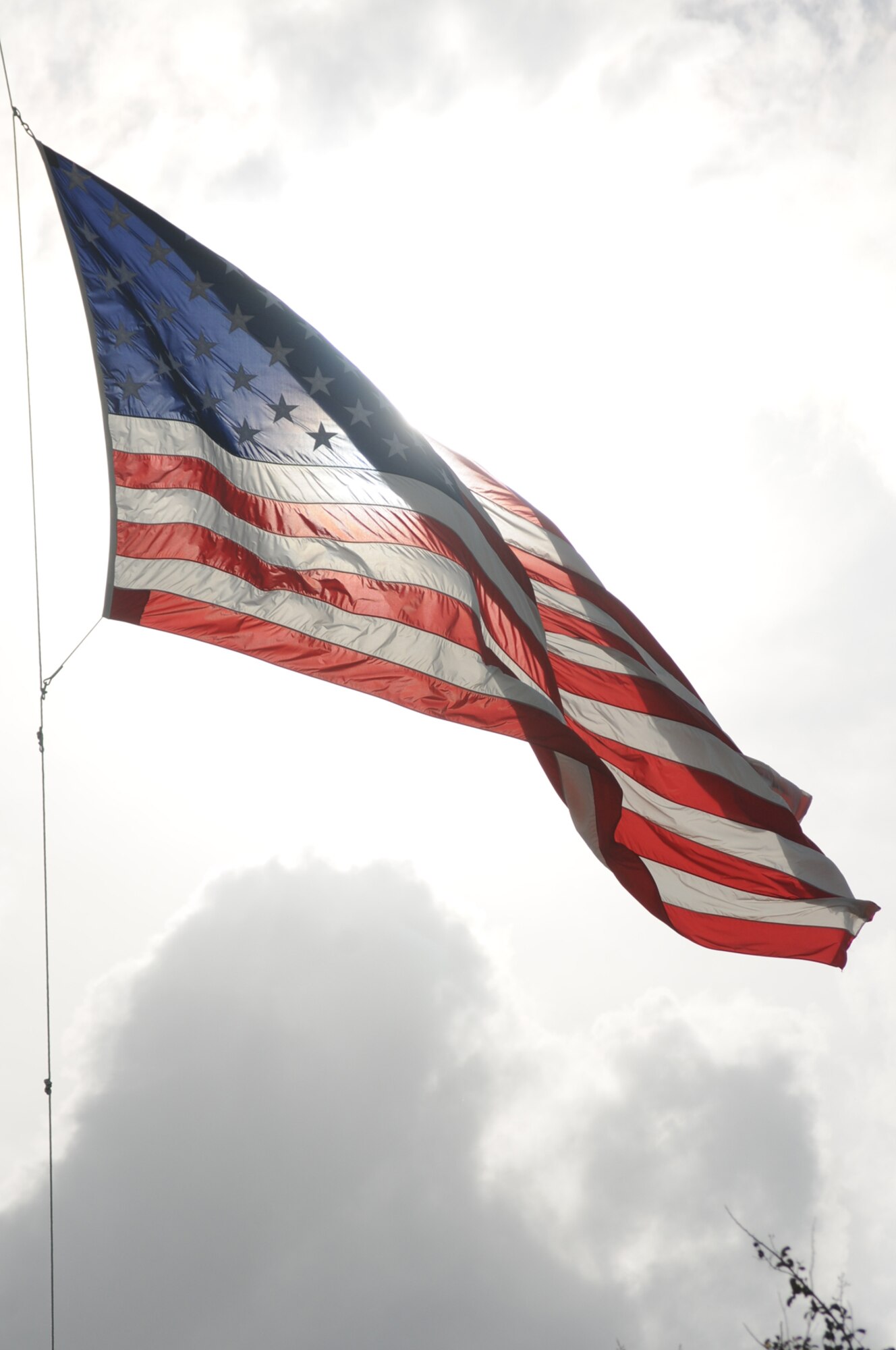 The 81st Training Wing flag flies at half-mast today in remembrance of the victims, families and heroes of  Sept. 11, 2001.  (U.S. Air Force photo by Kemberly Groue)