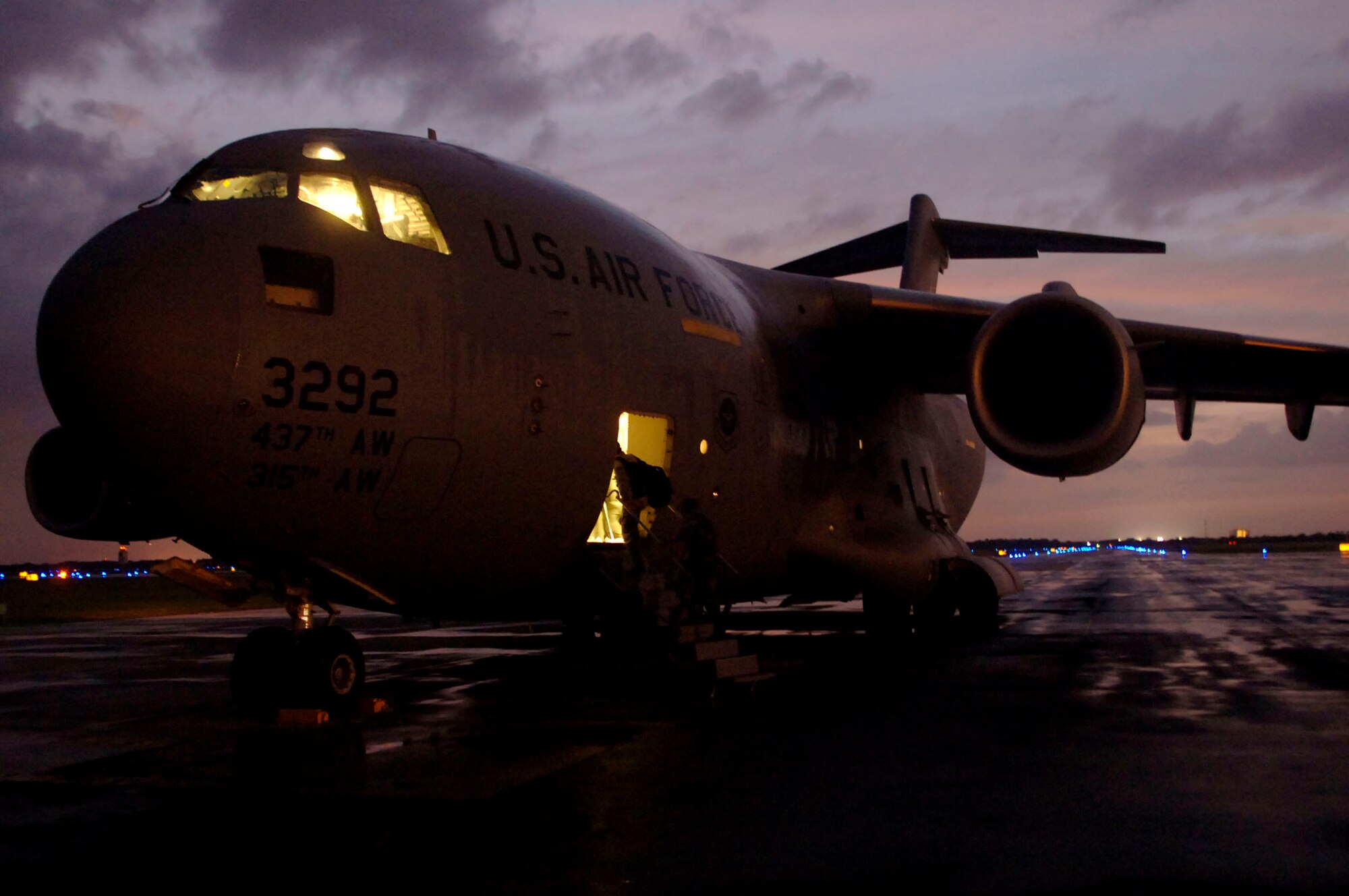Members of a mobile aeromedical staging facility team from MacDill Air Force Base, Fla., board a plane headed to Corpus Christi, Texas, to support Hurricane Ike evacuation efforts there. (U.S. Air Force photo/Staff Sgt. Joseph L. Swafford Jr.)