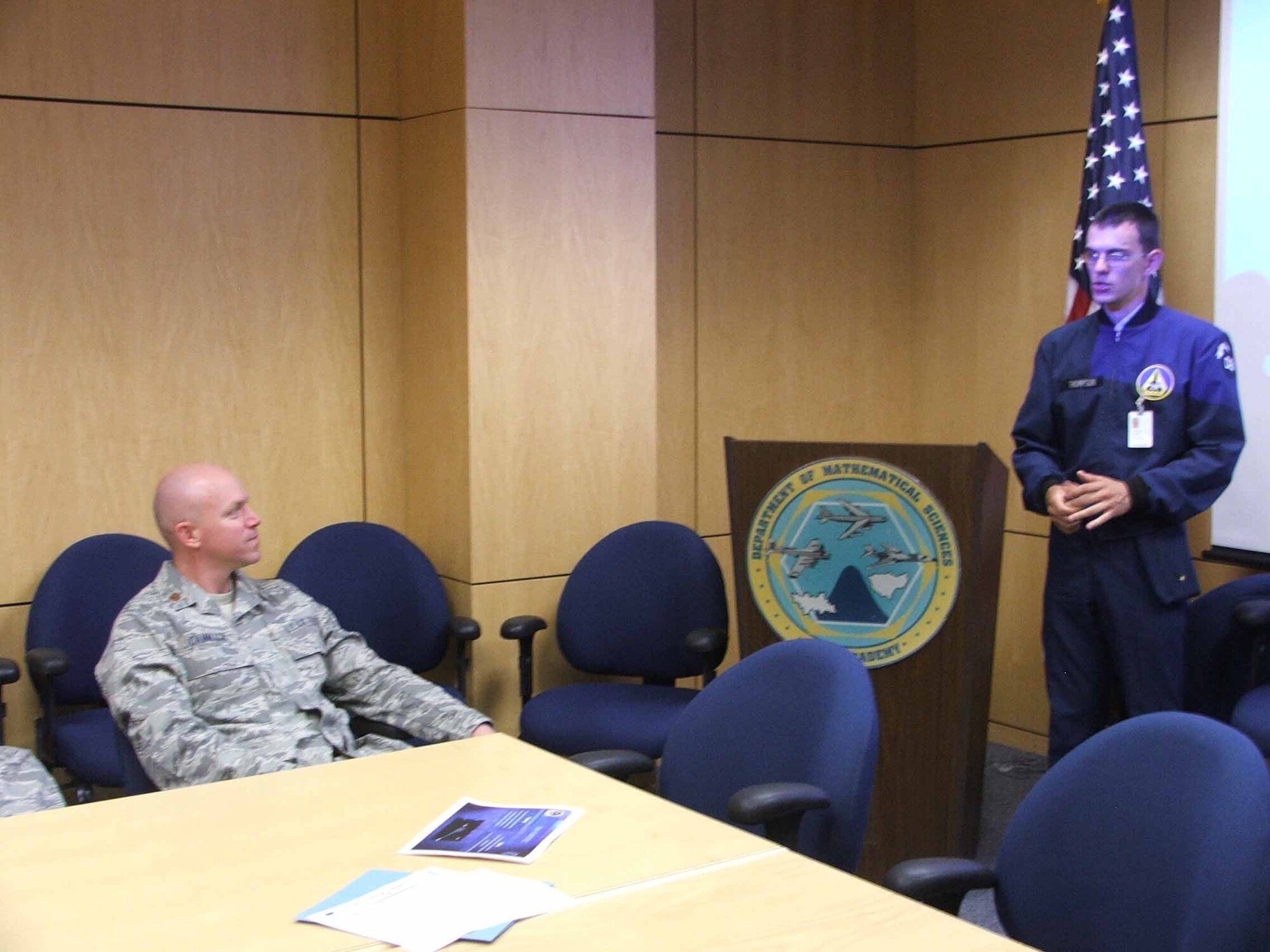 Cadet First Class Jeremy Thompson briefs the outcome of his Wideband Global Satcom reliability study to Maj. Dan Cammack. Cadet Thompson spent five weeks at the Air Force Operational Test and Evaluation Center’s Detachment 4 at Peterson AFB, Colo., as part of a mentoring program between AFOTEC and the U.S. Air Force Academy. The program leverages AFOTEC experience in operations, acquisitions, and test to create a comprehensive mentoring program to assist USAFA cadets during their academic and professional development.