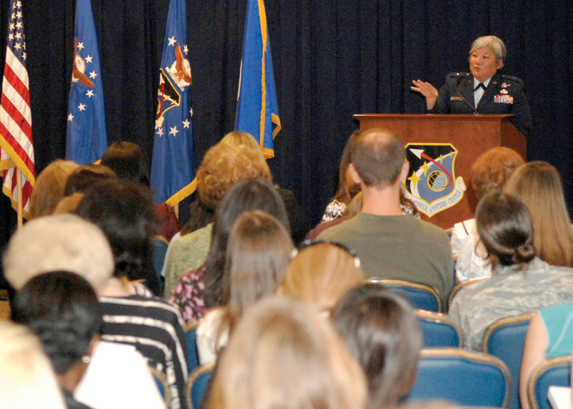 Brig. Gen. Susan Mashiko, Space and Systems Missiles Systems Center vice commander speaks to attendees at the Aerospace Women’s Committee Seminar during "Women's Week." on the topic of mentoring, Aug. 26. The week-long celebration was hosted by The Aerospace Women's Committee (AWC). This year's celebration partnered with the Los Angeles Air Force Base Federal Women's Program. (Photo by Stephen Schester)