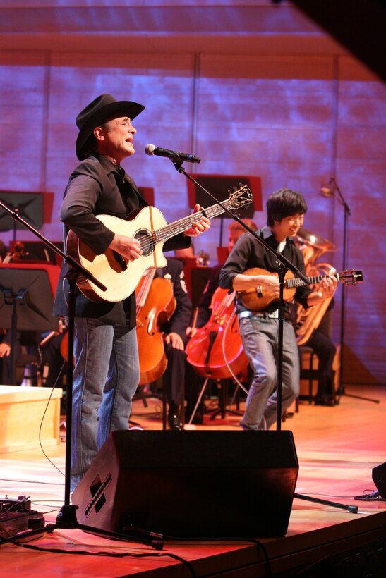 Country Music superstar Clint Black regaled the audience with his hit songs “The Shoes You’re Wearing” and “Spend My Time” as part of the U.S. Air Force Band television special titled “America’s Veterans: A Musical Tribute.” The show was taped at the Music Center at Strathmore in North Bethesda, Md., and will air nationally on public television and overseas on American Forces Network over the Veterans Day holiday. Also appearing on the program are two-time Grammy Award-winner Patti LaBelle, Academy Award-winning Actor Cliff Robertson and ukulele master Jake Shimabukuro.