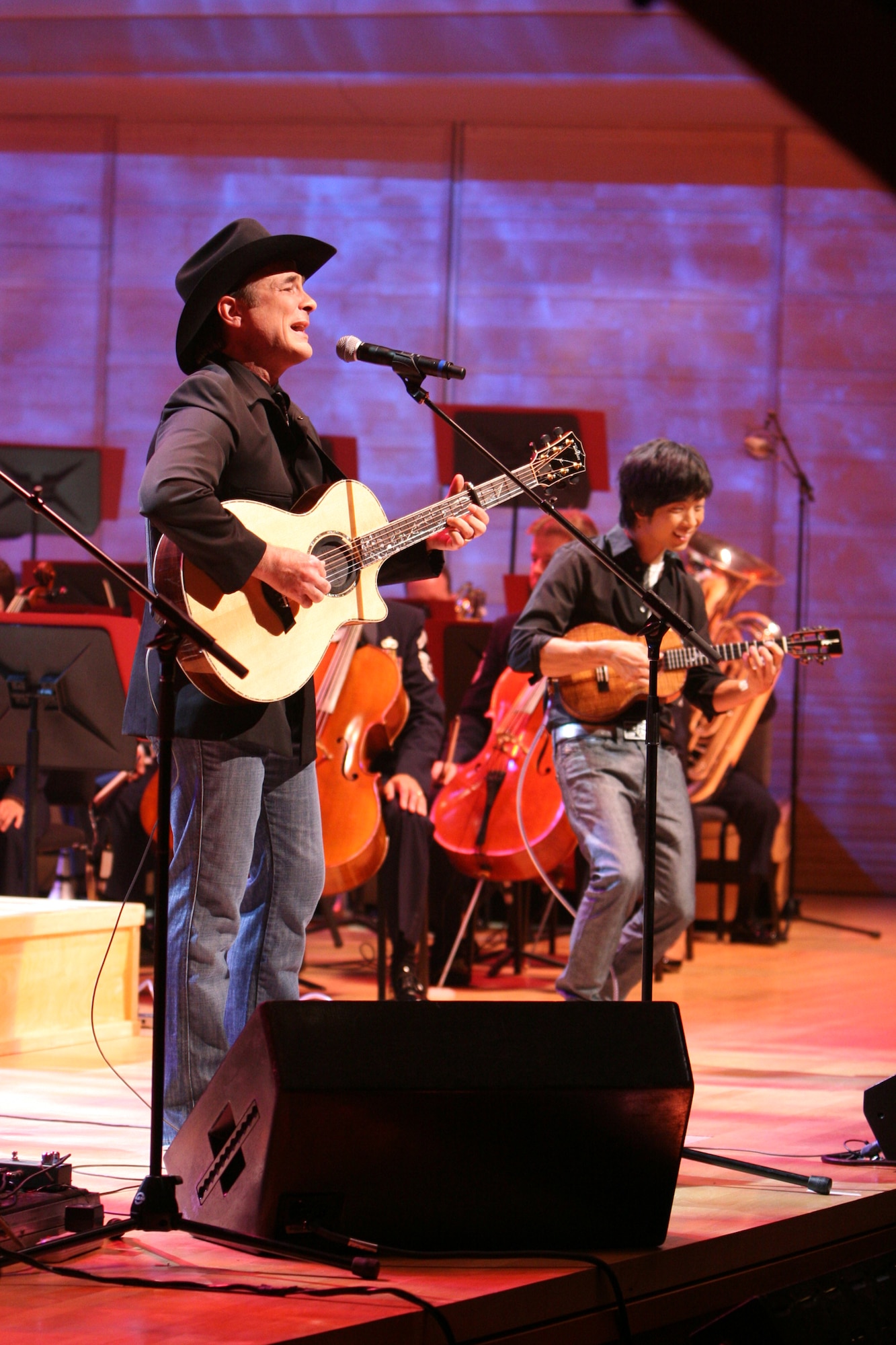 Country Music superstar Clint Black regaled the audience with his hit songs “The Shoes You’re Wearing” and “Spend My Time” as part of the U.S. Air Force Band television special titled “America’s Veterans: A Musical Tribute.” The show was taped at the Music Center at Strathmore in North Bethesda, Md., and will air nationally on public television and overseas on American Forces Network over the Veterans Day holiday. Also appearing on the program are two-time Grammy Award-winner Patti LaBelle, Academy Award-winning Actor Cliff Robertson and ukulele master Jake Shimabukuro.