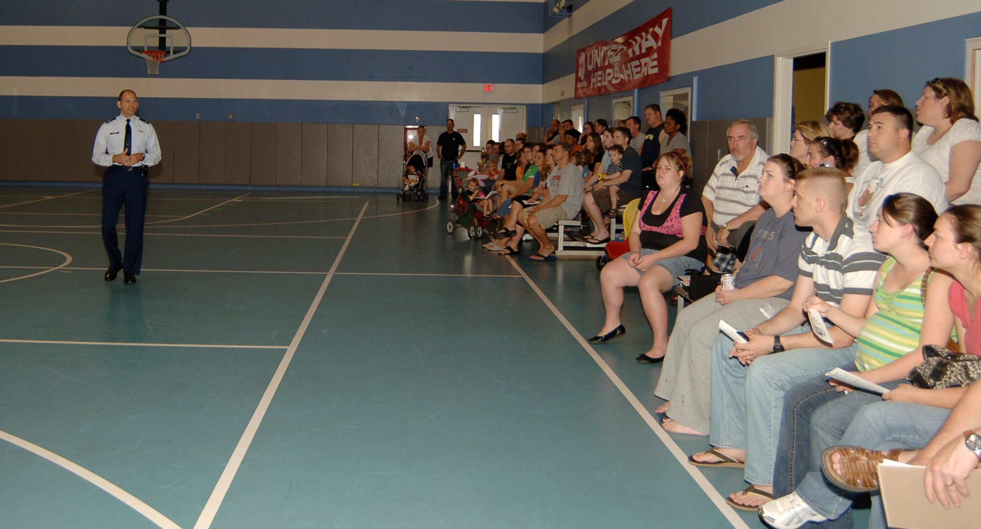 MCCONNELL AIR FORCE BASE, Kan. -- Colonel James C. Vechery, 22nd Air Refueling Wing commander, speaks to McConnell base housing residents about the many changes that will effect them in the future at a housing town hall Meeting, Aug. 27. Some of the main topics discussed were introductions of new housing personnel, landscaping concerns, construction projects and privatization of housing. (Photo by Airman 1st Class Maria Ruiz)