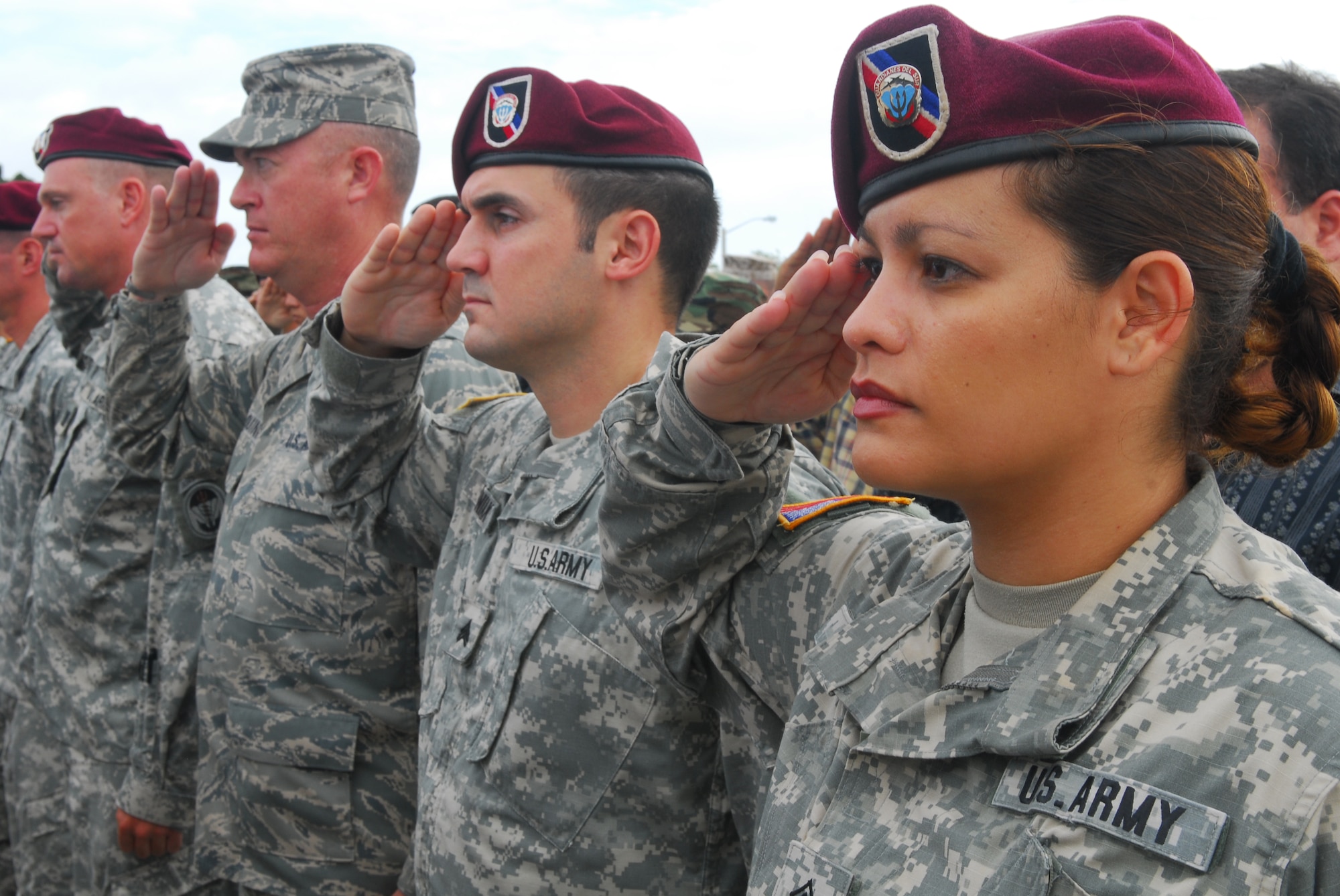 Staff Sgt. Aida Acevedo, Special Operations Command South, Homestead Air Reserve Base, Fla., salutes the U.S. flag during the lowering of the colors to remember the tragic events of Sept. 11, 2001.  SOCSOUTH is a subordinate component for special operations under the U.S. Southern Command, which is headquartered in the City of Doral, Fla. The command’s Area of Focus encompasses the land mass and adjacent waters of Latin America south of Mexico covering about 15.6 million square miles. (U.S. Army photo/Sgt. 1st Class Felix Figueroa, SOCSO PAO)
