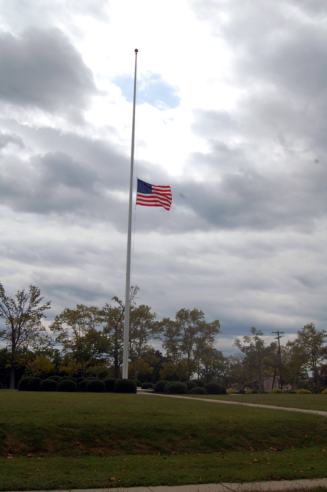 The post flagpole on Fort Dix, N.J., shows the American flag at half-mast Sept. 11, 2008, in honor of the victims of Sept. 11, 2001.  (U.S. Air Force Photo/Tech. Sgt. Scott T. Sturkol)