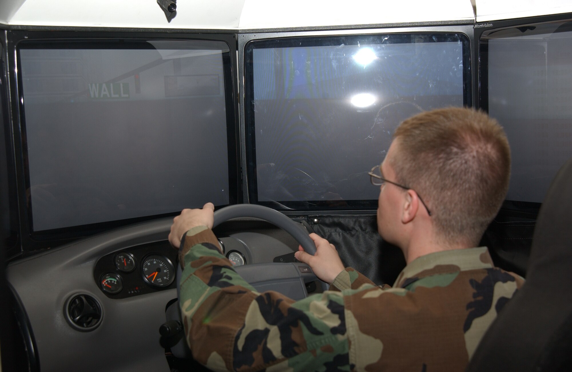 First Lt. Daniel Hoffman, 375th Communications Support Squadron executive, participates in a simulator designed to show the effects of drunk driving during the Save a Life tour Sept. 4 at the Scott Club. The simulator had all the amenities of a real car. The driver had four minutes to reach their destination safely and without getting pulled over, but the trick was that the car "got drunk" every 20 seconds making it difficult to maneuver. The goal is to educate Airman to avoid the loss of any Airman to drunk driving.

(U.S. Air Force photo/Airman 1st Class Amber Kelly-Woodward)