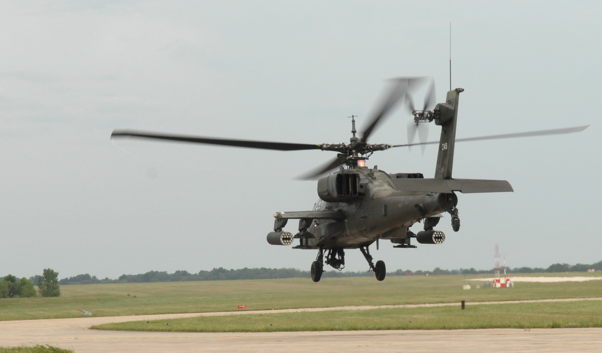 WHITEMAN AIR FORCE BASE, Mo. – AH-64A Apache takes off after being loaded to fire its munitions at Ft. Leonard Wood Sept. 6. The Missouri Army National Guard’s 1-135th Attack Recon Battalion recently implemented a new training program that allows pilots to arm and fly three AH-64 Apache helicopters from Whiteman AFB to Fort Leonard Wood for the first time to practice aerial gunnery at their monthly drill. (U.S. Air Force photo/Senior Airman Stephen Linch)