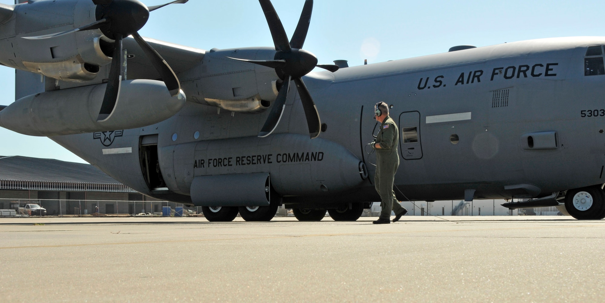 Tech. Sgt. Scott Blair prepares to board a WC-130J Hurricane Hunter Sept. 10 at Keesler Air Force Base, Miss. Sergeant Blair is responsible for the safety of the aircraft and is also tasked with launching and gathering weather data through the use of an instrument called a dropsonde. Sergeant Blair is a weather reconnaissance loadmaster. (U.S. Air Force photo/Tech. Sgt. James B. Pritchett) 

