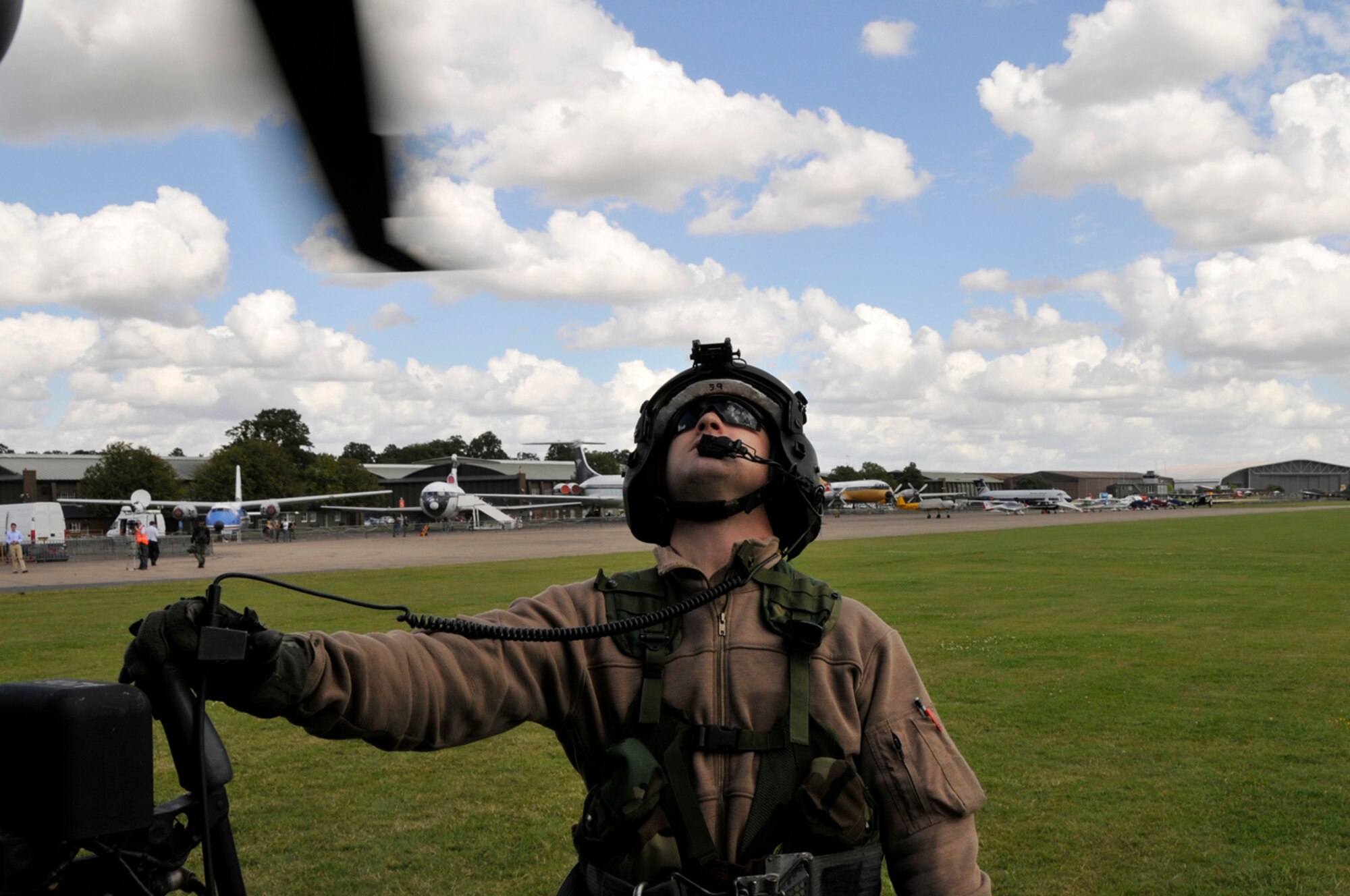 Senior Airman Derek Brock, 56th Rescue Squadron examines the main rotor on an HH-60G Pave Hawk during the pre-flight checklist at Duxford, England. (U.S. Air Force photo by Airman 1st Class Perry Aston)