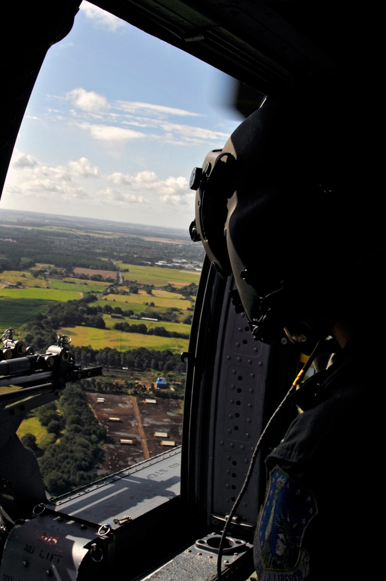 Senior Airman Charles Hippler, 56th Rescue Squadron takes in the British scenery of Suffolk, England. The 56th Rescue Squadron flew to the Imperial War Museum Duxford to participate in an aviation event Aug. 14. (U.S. Air Force photo by Airman 1st Class Perry Aston)