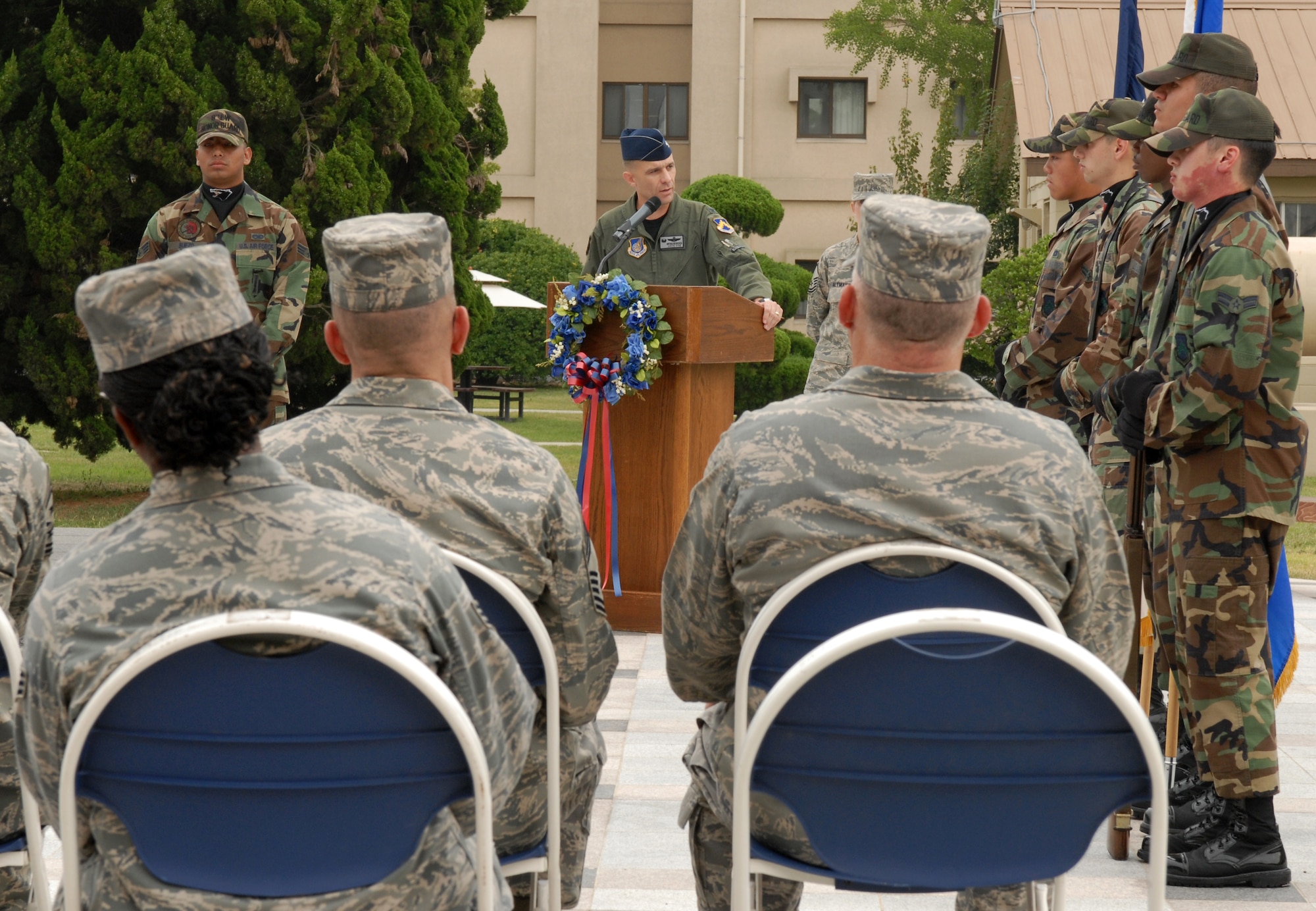 KUNSAN AIR BASE, Republic of Korea -- Col. Bryan ?WOLF? Bearden, the 8th Fighter Wing commander, speaks about his 9/11 experience during the a ceremony here, Sept. 11 at the base?s Medal of Honor monument. The remembrance ceremony has been held each year here to honor the fallen in the attacks Sept. 11, 2001. (U.S. Air Force photo/Senior Airman Gustavo Gonzalez)