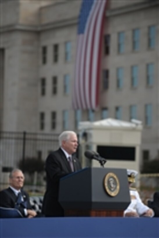 Secretary of Defense Robert M. Gates speaks at the Pentagon Memorial dedication ceremony on Sept. 11, 2008.  The national memorial is the first to be dedicated to those killed at the Pentagon on Sept. 11, 2001.  The site contains 184 inscribed memorial units honoring the 59 people aboard American Airlines Flight 77 and the 125 in the building who lost their lives that day.  