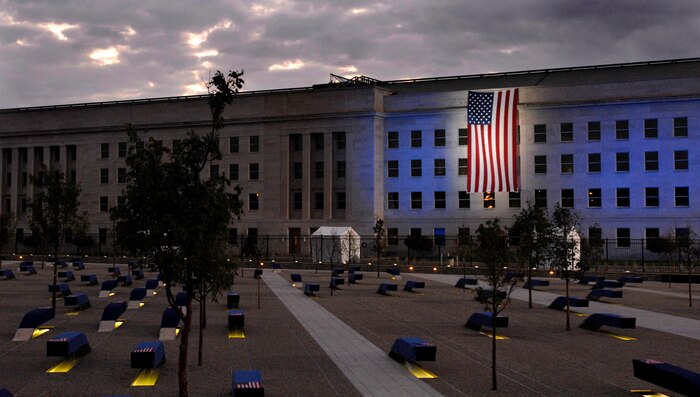 The Sept. 11, 2008 dawn breaks over the new Pentagon Memorial to be dedicated today in a ceremony attended by President George W. Bush, Vice President Dick Cheney, Secretary of Defense Robert M. Gates and Former Secretary of Defense Donald H. Rumsfeld as well as the senior leadership of the armed forces. The memorial,  the first of three national memorials to the 9/11 victims to be completed, contains 184 benches in honor of those who died.