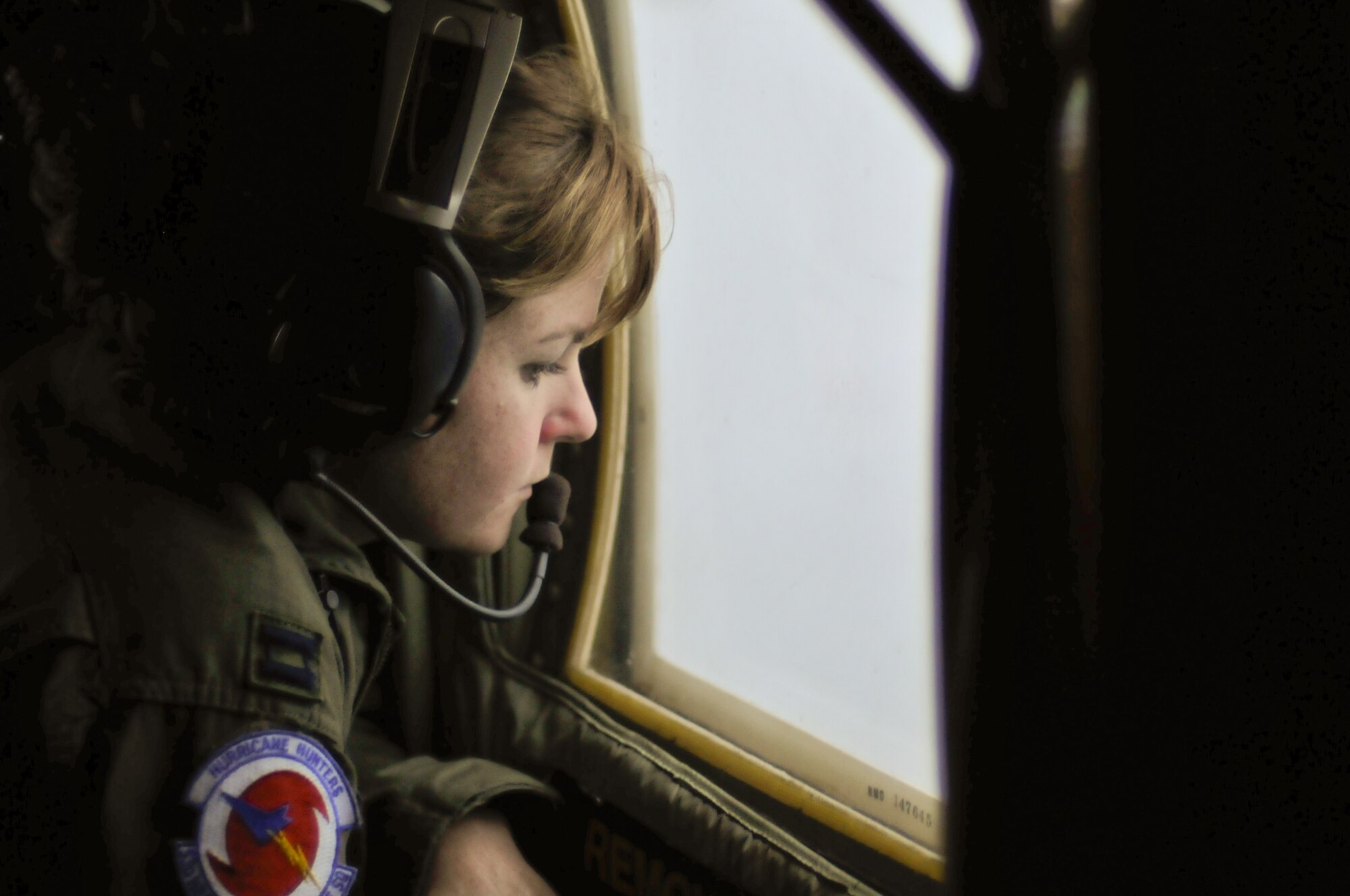 An emergency call from Air Force Rescue requested support from the Hurricane Hunters in finding a person who fell overboard without a life raft into the Gulf of Mexico. The Air Force Reserve's Hurricane Hunters are fequently called on to support rescue efforts in tropical weather because they are usually the only aircraft near the scene. Capt. Kaitlyn McLaughlin, flight meterologist, as well as the rest of the crew visually scanned the surface for any signs of the missing boater. (U.S. Air Force Photo/Tech. Sgt. James B. Pritchett)