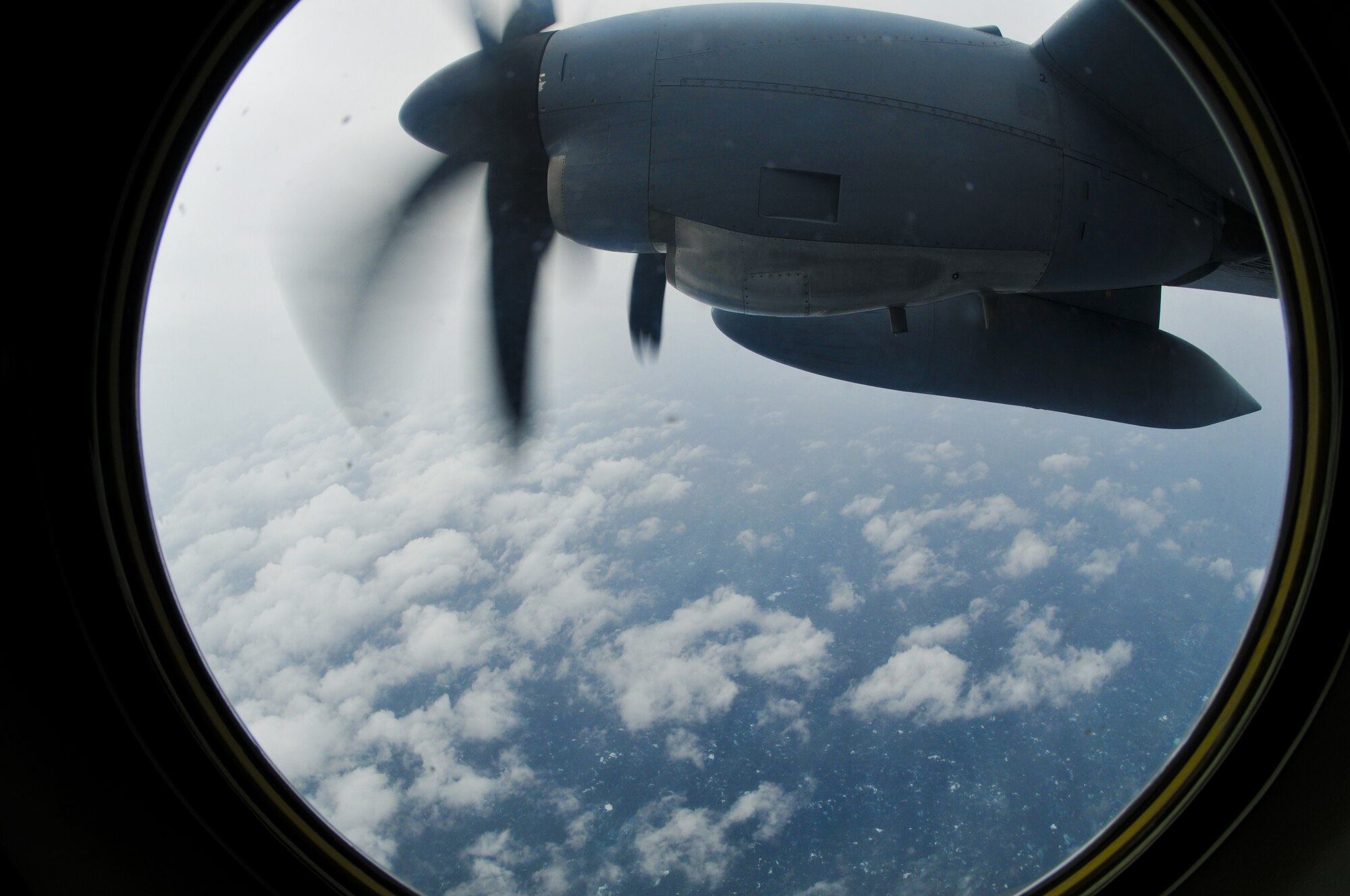 Inside the eye of Hurricane Ike, a WC-130J Hurricane Hunter aircraft provides data from several different instruments including sensors on the aircraft, dropsondes and the new Stepped-Frequency Microwave Radiometer, called a Smurf. The Smurf provides surface-level winds giving forecasters at the National Hurricane Center yet another source of information.  (U.S. Air Force Photo/Tech. Sgt. James B. Pritchett)