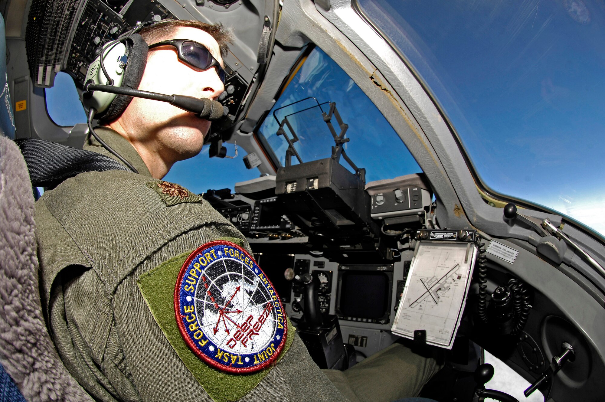 Maj. Jason Allen looks out over the ice as he delivers more than 64,000 pounds of supplies and equipment to Antarctica Sept. 10. The cargo movement was conducted by Joint Task Force Support Forces Antarctica, headquartered at Hickam Air Force Base, Hawaii, and led by 13th Air Force. The joint task force is currently conducting Operation Deep Freeze in support of the National Science Foundation and U.S. Antarctic Program. Major Allen is a Reserve C-17 evaluator pilot with the 97th Airlift Squadron at McChord AFB, Wash., (U.S. Air Force photo/Master Sgt. Chris Vadnais) 
