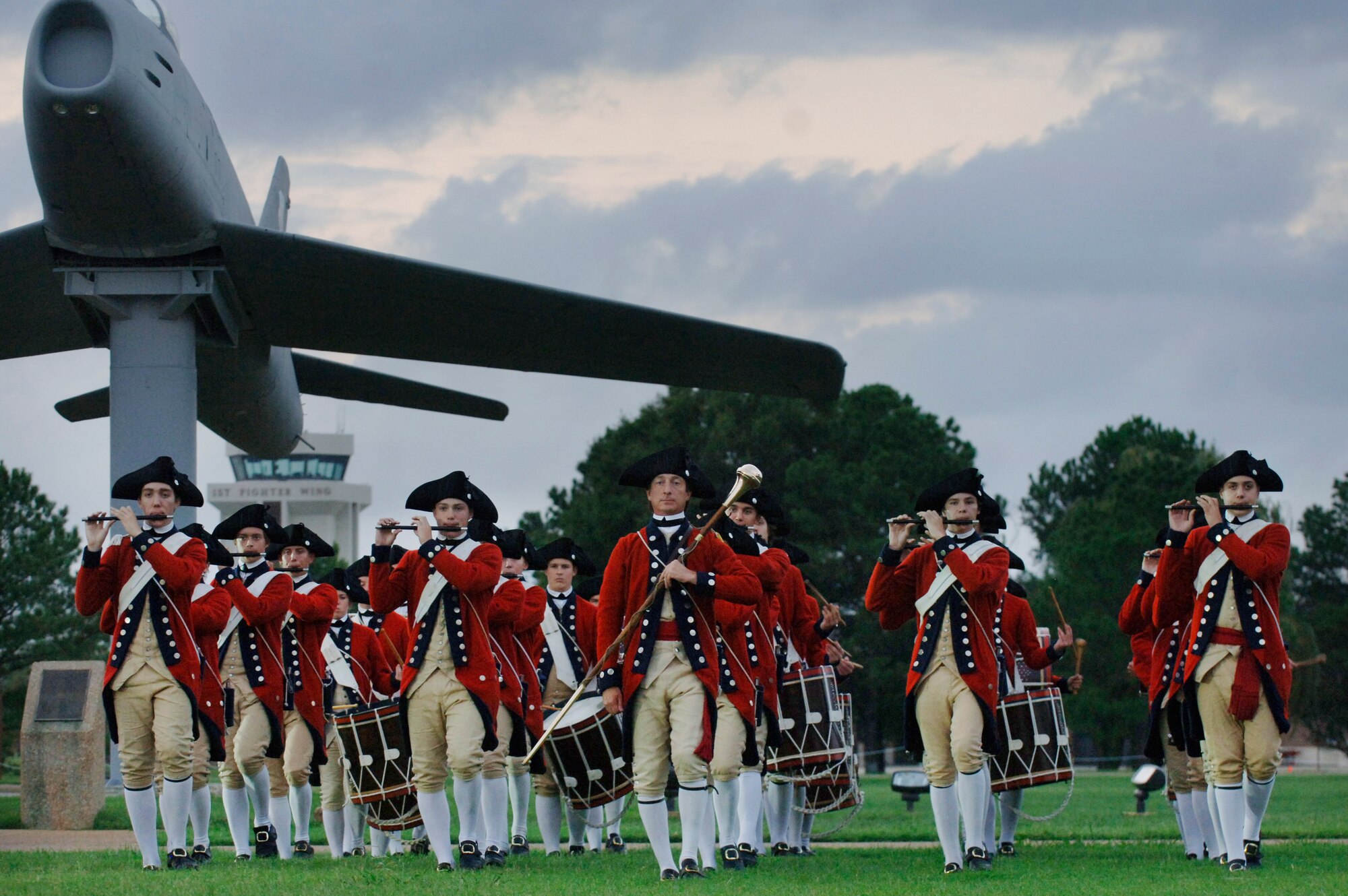 LANGLEY AIR FORCE BASE, Va. -- The Fifes and Drums of Colonial Williamsburg led by Mr. Lance Pedigo, director, march during the Air Combat Command Tattoo ceremony Sept. 11.  The ACC Tattoo tribute is a 75-minute production that honors America's Airmen, both past and present.  (U.S. Air Force photo/Senior Airman Vernon Young)